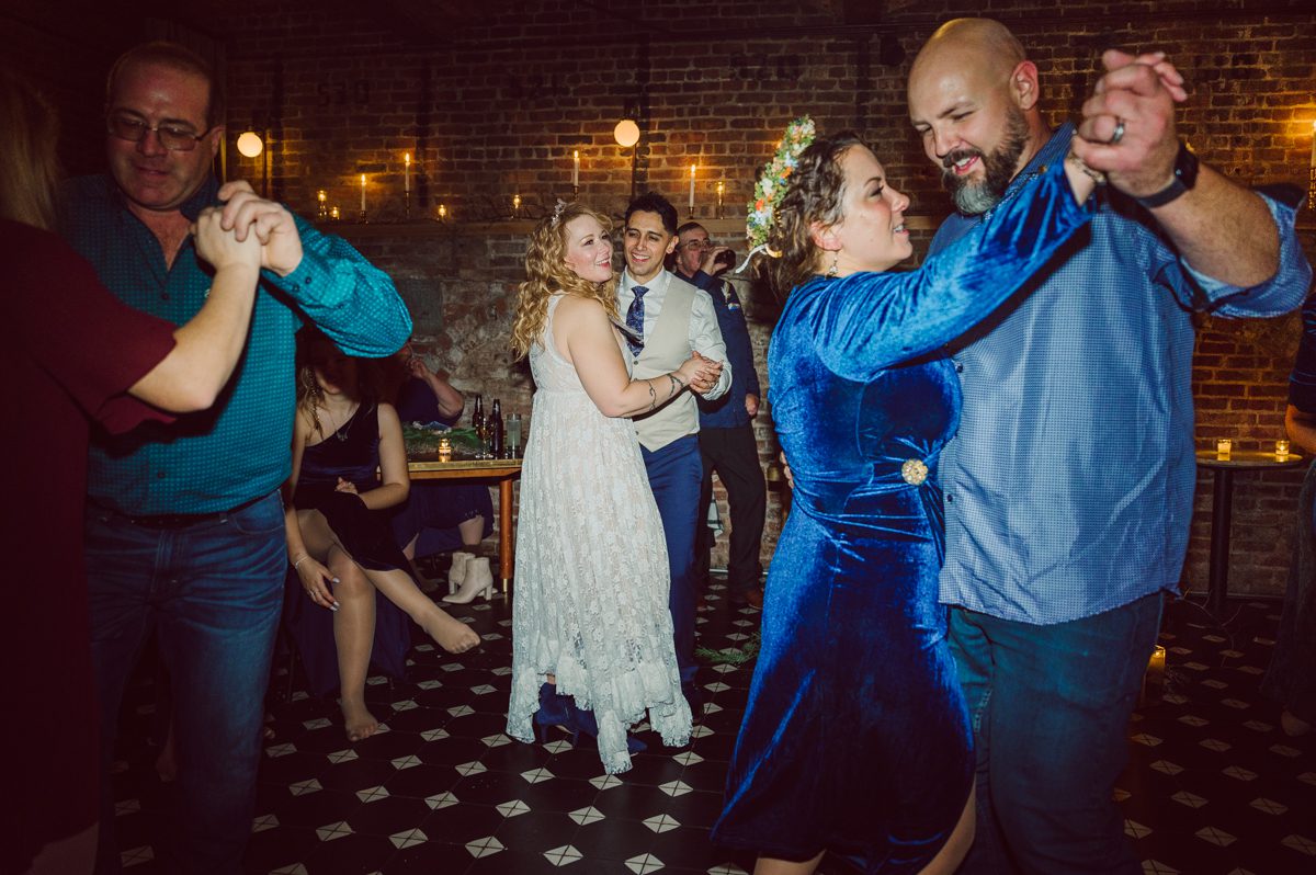 Since it was Friday and I did not wanted to get stuck in morning rush hour, I left for Brooklyn early! Friday December 2, I was on my way to document my last wedding of 2022 at Wythe Hotel in Brooklyn NY. I knew today was going to be great not just because I am photographing my last wedding of 2022 at Wythe Hotel in Brooklyn NY but because we are celebrating Jenny and Anderson two beautiful, pure and amazing human beings who are madly in love. Jenny is hairstylist for TV and Film where she gets to work with actors and actresses, she goes by JT Franchuk and some of her clients include Susan Sarandon in Maybe I do, Chloe Moretz in The Peripheral on Netflix as well as Halston also on Netflix. And Anderson is from Columbia, where he self taught himself during the pandemic and recently got a job at JP Morgan. These two amazingly talented and genuine lovers wedding day was finally here and I was here for all that they had planned for their wedding at Wythe Hotel Brooklyn NY. Jenny got ready at an airbnb on Vernon Ave and Anderson was getting a fresh cut at Cotter Barber Shop on Graham Ave. Jenny and Anderson's wedding day ran so smoothly due to amazing planner Cristina from Carismas Design. Jenny and Anderson's first look at Cooper Room at Wythe Hotel, then Jenny had her first look with her father and grandfather which was very emotional. The with Jenny and Anderson we walked around Wythe Hotel to do some more wedding portrait. Jenny and Anderson's cocktail hour was held at Pent House Loft/ Loft Room at Wythe Hotel then we all headed back down to Cooper Room Cellar for Jenny and Anderson's wedding reception. Jenny and Anderson's Wythe Hotel Brooklyn NY wedding documented by Karis from Hey Karis New York, Brooklyn, Hudson Valley and Catskills Wedding Photographer and NYC Elopement Photographer.