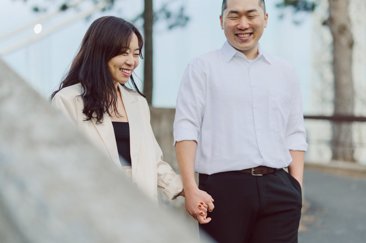 Kicking off 2023 engagement season with Chloe and Bosco's Fort Lee, NJ engagement session. We first met at Ross Dock Picnic Area in Fort Lee with GW bridge in the background to Fort Lee Historic Park where we can get closer shot of GW Bridge. Chloe and Bosco even thought it was bit chilly and windy did amazing listening and following all my weird and funny directions where I did some traditional classic couple's poses then fun, action shots. Chloe and Bosco's Fort Lee NJ engagement session captured by Karis from Hey Karis NY, NJ, Brooklyn, Hudson Valley and Catskills Wedding and Elopement Photographer.
