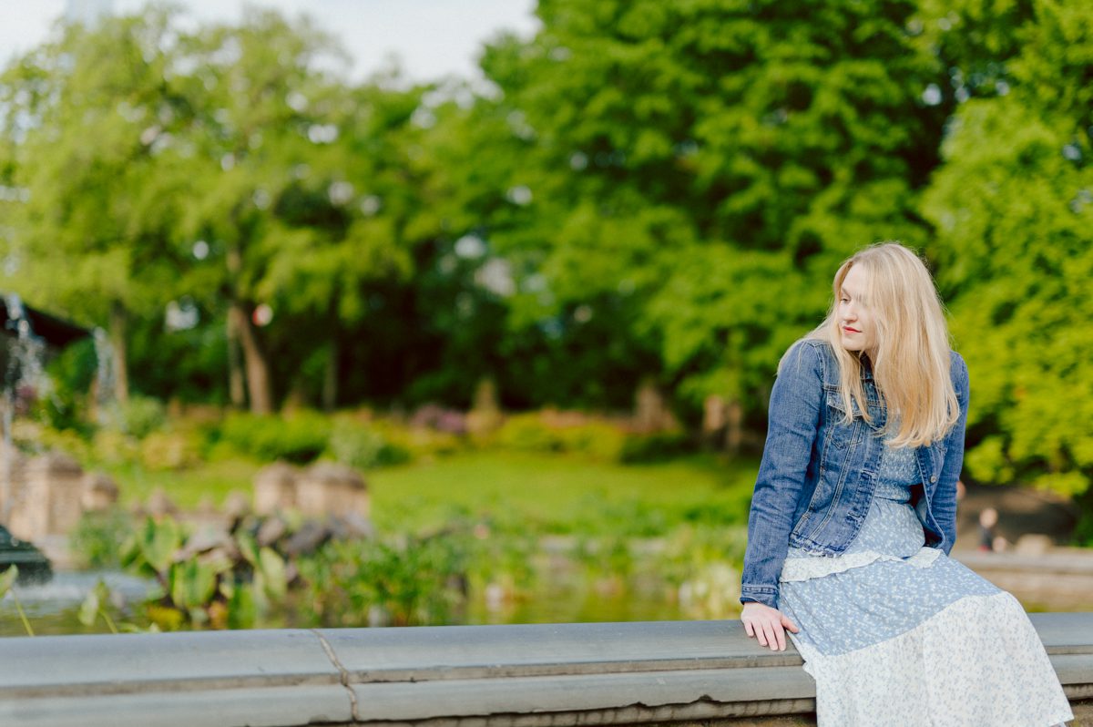 Off leash hour has officially started at Bethesda Fountain in Central Park NY, which is really the best time to go to Bethesda Fountain but only if you are a dog lover! There will be all kind of different personalities of dogs running wild around Bethesda Fountain off leash having the best time of their lives and I can sit there watching these adorable creatures all day long! But today I was there to photograph Katie and Craig and needed to stay focused. Katie and Craig were absolutely the best humans and fellow animal/nature lovers like me so we walked around and may have gotten lost in the woody forest of Central Park but this Central Park engagement session was bit different because Katie and Craig wanted to focus on the nature so we went looking for the lush greens and florals of Central Park. Bethesda Fountain Central Park NY engagement session documented by by Karis | Hey Karis | Catskills, Hudson Valley NY, elopement and wedding photographer | Brooklyn NY elopement and wedding photographer | Manhattan NY elopement and wedding photographer | Hey Karis is fun documentary wedding and elopement photographer.