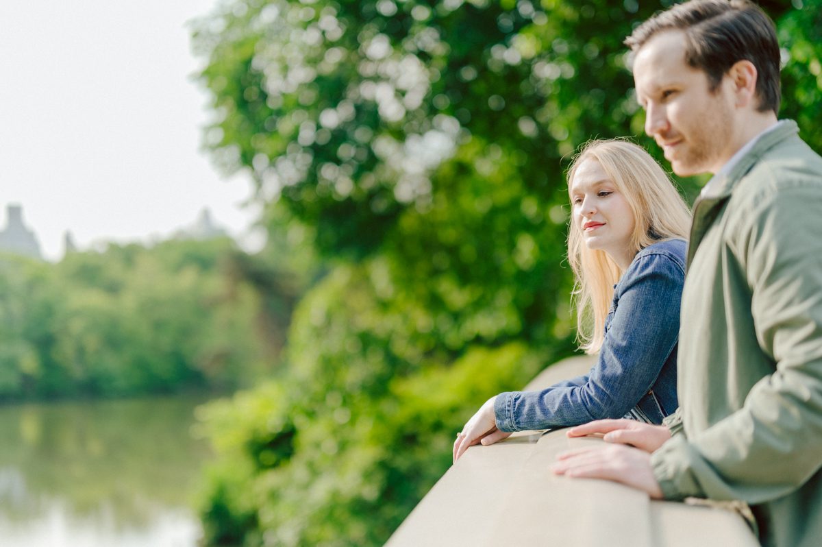Off leash hour has officially started at Bethesda Fountain in Central Park NY, which is really the best time to go to Bethesda Fountain but only if you are a dog lover! There will be all kind of different personalities of dogs running wild around Bethesda Fountain off leash having the best time of their lives and I can sit there watching these adorable creatures all day long! But today I was there to photograph Katie and Craig and needed to stay focused. Katie and Craig were absolutely the best humans and fellow animal/nature lovers like me so we walked around and may have gotten lost in the woody forest of Central Park but this Central Park engagement session was bit different because Katie and Craig wanted to focus on the nature so we went looking for the lush greens and florals of Central Park. Bethesda Fountain Central Park NY engagement session documented by by Karis | Hey Karis | Catskills, Hudson Valley NY, elopement and wedding photographer | Brooklyn NY elopement and wedding photographer | Manhattan NY elopement and wedding photographer | Hey Karis is fun documentary wedding and elopement photographer.