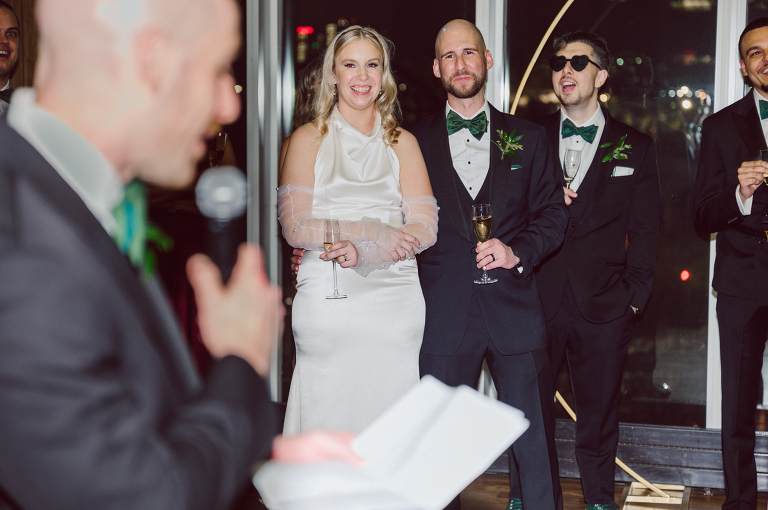 I've photographed multiple of Chris' best friends weddings several years ago. One couple at Tribeca Rooftop NY, another couple at Oheka Castle NY and few other friends at Long Island. So Chris knew when he was going to get married he would hire me. Few years later I get an email from Chris regarding his wedding. These are my dream ideal clients, because they know they will be hiring me even before they meet with me! After a quick phone call, Kaci and Chris booked and their engagement session date was set. We went to Orchard St in NYC where they used to live, walked around their old neighborhood while getting some engagement pics. Kaci and Chris' wedding at The Standard High Line, NY on April 22, 2023. It was raining for the whole week prior to Kaci and Chris wedding day making me bit worried but rain stopped on the morning of Kaci and Chris' wedding at The Standard High Line, NY. Kaci and Chris each got their own hotel rooms to get ready. With quite a big bridal party 10 bridesmaids and 10 groomsmen Kaci and Chris popped champagne bottles. With champagne glasses in their hands Kaci and her brides people laughed as they got their MUAH done by Face Time Beauty at The Standard High Line, NY. And Chris along with his groomsmen got ready in their very retro "Mad Men" vibe room fooling and goofing around till the ceremony at The Standard High Line, NY. Kaci and Chris wedding was held at The High Line Room and Terrace which overlooks The High Line, NY. Weather was gorgeous and I was excited to take Kaci and Chris to The High Line for their wedding portraits but unfortunately during their wedding ceremony at The High Line Room it started pouring! They say it's good luck when it rains on your wedding day, right! Unfortunately, going to The High Line for photos was no go, so backup was at The Terrace where the cocktail hour was going on and which was not even that big of a space. But with help of everyone I managed to get 22 people group photo done on The Terrace while the cocktail hour was going on and all the family formal photos as well as all the bridal party pairs. with only few minutes till Kaci and Chris' wedding reception at The High Line Room, we went up to The Top of Standard for Kaci and Chris' wedding portraits. Working super fast I managed to get good enough amount of wedding portraits of just Kaci and Chris. Music by Jack from LJDJ was playing, Kaci and Chris' wedding reception at The High Line Room at The Standard Hotel High Line NY was about to begin. Kaci and Chris' wedding reception at The Standard High Line was on fire from start to the last second of the evening. It was pouring outside, young people didn't seem to care it was raining and congregated the streets of Meatpacking District while I was weaving through the crowd of party goers to get home as quickly as possible. The night was just starting for them and I was ready for bed. Kaci and Chris' The High Line Room and Terrace, The Standard High Line, NY wedding documented by by Karis | Hey Karis | Catskills, Hudson Valley NY, elopement and wedding photographer | Brooklyn NY elopement and wedding photographer | Manhattan NY elopement and wedding photographer | Hey Karis is fun documentary wedding and elopement photographer.
