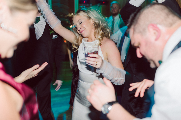 I've photographed multiple of Chris' best friends weddings several years ago. One couple at Tribeca Rooftop NY, another couple at Oheka Castle NY and few other friends at Long Island. So Chris knew when he was going to get married he would hire me. Few years later I get an email from Chris regarding his wedding. These are my dream ideal clients, because they know they will be hiring me even before they meet with me! After a quick phone call, Kaci and Chris booked and their engagement session date was set. We went to Orchard St in NYC where they used to live, walked around their old neighborhood while getting some engagement pics. Kaci and Chris' wedding at The Standard High Line, NY on April 22, 2023. It was raining for the whole week prior to Kaci and Chris wedding day making me bit worried but rain stopped on the morning of Kaci and Chris' wedding at The Standard High Line, NY. Kaci and Chris each got their own hotel rooms to get ready. With quite a big bridal party 10 bridesmaids and 10 groomsmen Kaci and Chris popped champagne bottles. With champagne glasses in their hands Kaci and her brides people laughed as they got their MUAH done by Face Time Beauty at The Standard High Line, NY. And Chris along with his groomsmen got ready in their very retro "Mad Men" vibe room fooling and goofing around till the ceremony at The Standard High Line, NY. Kaci and Chris wedding was held at The High Line Room and Terrace which overlooks The High Line, NY. Weather was gorgeous and I was excited to take Kaci and Chris to The High Line for their wedding portraits but unfortunately during their wedding ceremony at The High Line Room it started pouring! They say it's good luck when it rains on your wedding day, right! Unfortunately, going to The High Line for photos was no go, so backup was at The Terrace where the cocktail hour was going on and which was not even that big of a space. But with help of everyone I managed to get 22 people group photo done on The Terrace while the cocktail hour was going on and all the family formal photos as well as all the bridal party pairs. with only few minutes till Kaci and Chris' wedding reception at The High Line Room, we went up to The Top of Standard for Kaci and Chris' wedding portraits. Working super fast I managed to get good enough amount of wedding portraits of just Kaci and Chris. Music by Jack from LJDJ was playing, Kaci and Chris' wedding reception at The High Line Room at The Standard Hotel High Line NY was about to begin. Kaci and Chris' wedding reception at The Standard High Line was on fire from start to the last second of the evening. It was pouring outside, young people didn't seem to care it was raining and congregated the streets of Meatpacking District while I was weaving through the crowd of party goers to get home as quickly as possible. The night was just starting for them and I was ready for bed. Kaci and Chris' The High Line Room and Terrace, The Standard High Line, NY wedding documented by by Karis | Hey Karis | Catskills, Hudson Valley NY, elopement and wedding photographer | Brooklyn NY elopement and wedding photographer | Manhattan NY elopement and wedding photographer | Hey Karis is fun documentary wedding and elopement photographer.
