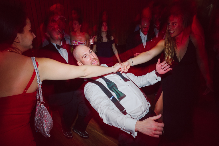 I've photographed multiple of Chris' best friends weddings several years ago. One couple at Tribeca Rooftop NY, another couple at Oheka Castle NY and few other friends at Long Island. So Chris knew when he was going to get married he would hire me. Few years later I get an email from Chris regarding his wedding. These are my dream ideal clients, because they know they will be hiring me even before they meet with me! After a quick phone call, Kaci and Chris booked and their engagement session date was set. We went to Orchard St in NYC where they used to live, walked around their old neighborhood while getting some engagement pics. Kaci and Chris' wedding at The Standard High Line, NY on April 22, 2023. It was raining for the whole week prior to Kaci and Chris wedding day making me bit worried but rain stopped on the morning of Kaci and Chris' wedding at The Standard High Line, NY. Kaci and Chris each got their own hotel rooms to get ready. With quite a big bridal party 10 bridesmaids and 10 groomsmen Kaci and Chris popped champagne bottles. With champagne glasses in their hands Kaci and her brides people laughed as they got their MUAH done by Face Time Beauty at The Standard High Line, NY. And Chris along with his groomsmen got ready in their very retro "Mad Men" vibe room fooling and goofing around till the ceremony at The Standard High Line, NY. Kaci and Chris wedding was held at The High Line Room and Terrace which overlooks The High Line, NY. Weather was gorgeous and I was excited to take Kaci and Chris to The High Line for their wedding portraits but unfortunately during their wedding ceremony at The High Line Room it started pouring! They say it's good luck when it rains on your wedding day, right! Unfortunately, going to The High Line for photos was no go, so backup was at The Terrace where the cocktail hour was going on and which was not even that big of a space. But with help of everyone I managed to get 22 people group photo done on The Terrace while the cocktail hour was going on and all the family formal photos as well as all the bridal party pairs. with only few minutes till Kaci and Chris' wedding reception at The High Line Room, we went up to The Top of Standard for Kaci and Chris' wedding portraits. Working super fast I managed to get good enough amount of wedding portraits of just Kaci and Chris. Music by Jack from LJDJ was playing, Kaci and Chris' wedding reception at The High Line Room at The Standard Hotel High Line NY was about to begin. Kaci and Chris' wedding reception at The Standard High Line was on fire from start to the last second of the evening. It was pouring outside, young people didn't seem to care it was raining and congregated the streets of Meatpacking District while I was weaving through the crowd of party goers to get home as quickly as possible. The night was just starting for them and I was ready for bed. Kaci and Chris' The High Line Room and Terrace, The Standard High Line, NY wedding documented by by Karis | Hey Karis | Catskills, Hudson Valley NY, elopement and wedding photographer | Brooklyn NY elopement and wedding photographer | Manhattan NY elopement and wedding photographer | Hey Karis is fun documentary wedding and elopement photographer.
