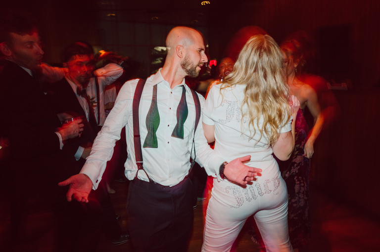 I've photographed multiple of Chris' best friends weddings several years ago. One couple at Tribeca Rooftop NY, another couple at Oheka Castle NY and few other friends at Long Island. So Chris knew when he was going to get married he would hire me. Few years later I get an email from Chris regarding his wedding. These are my dream ideal clients, because they know they will be hiring me even before they meet with me! After a quick phone call, Kaci and Chris booked and their engagement session date was set. We went to Orchard St in NYC where they used to live, walked around their old neighborhood while getting some engagement pics. Kaci and Chris' wedding at The Standard High Line, NY on April 22, 2023. It was raining for the whole week prior to Kaci and Chris wedding day making me bit worried but rain stopped on the morning of Kaci and Chris' wedding at The Standard High Line, NY. Kaci and Chris each got their own hotel rooms to get ready. With quite a big bridal party 10 bridesmaids and 10 groomsmen Kaci and Chris popped champagne bottles. With champagne glasses in their hands Kaci and her brides people laughed as they got their MUAH done by Face Time Beauty at The Standard High Line, NY. And Chris along with his groomsmen got ready in their very retro "Mad Men" vibe room fooling and goofing around till the ceremony at The Standard High Line, NY. Kaci and Chris wedding was held at The High Line Room and Terrace which overlooks The High Line, NY. Weather was gorgeous and I was excited to take Kaci and Chris to The High Line for their wedding portraits but unfortunately during their wedding ceremony at The High Line Room it started pouring! They say it's good luck when it rains on your wedding day, right! Unfortunately, going to The High Line for photos was no go, so backup was at The Terrace where the cocktail hour was going on and which was not even that big of a space. But with help of everyone I managed to get 22 people group photo done on The Terrace while the cocktail hour was going on and all the family formal photos as well as all the bridal party pairs. with only few minutes till Kaci and Chris' wedding reception at The High Line Room, we went up to The Top of Standard for Kaci and Chris' wedding portraits. Working super fast I managed to get good enough amount of wedding portraits of just Kaci and Chris. Music by Jack from LJDJ was playing, Kaci and Chris' wedding reception at The High Line Room at The Standard Hotel High Line NY was about to begin. Kaci and Chris' wedding reception at The Standard High Line was on fire from start to the last second of the evening. It was pouring outside, young people didn't seem to care it was raining and congregated the streets of Meatpacking District while I was weaving through the crowd of party goers to get home as quickly as possible. The night was just starting for them and I was ready for bed. Kaci and Chris' The High Line Room and Terrace, The Standard High Line, NY wedding documented by by Karis | Hey Karis | Catskills, Hudson Valley NY, elopement and wedding photographer | Brooklyn NY elopement and wedding photographer | Manhattan NY elopement and wedding photographer | Hey Karis is fun documentary wedding and elopement photographer.
