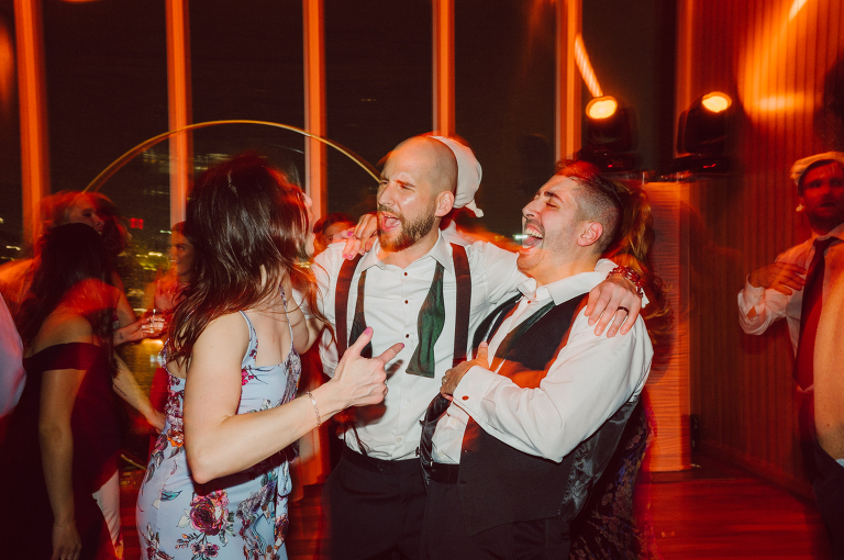 I've photographed multiple of Chris' best friends weddings several years ago. One couple at Tribeca Rooftop NY, another couple at Oheka Castle NY and few other friends at Long Island. So Chris knew when he was going to get married he would hire me. Few years later I get an email from Chris regarding his wedding. These are my dream ideal clients, because they know they will be hiring me even before they meet with me! After a quick phone call, Kaci and Chris booked and their engagement session date was set. We went to Orchard St in NYC where they used to live, walked around their old neighborhood while getting some engagement pics. Kaci and Chris' wedding at The Standard High Line, NY on April 22, 2023. It was raining for the whole week prior to Kaci and Chris wedding day making me bit worried but rain stopped on the morning of Kaci and Chris' wedding at The Standard High Line, NY. Kaci and Chris each got their own hotel rooms to get ready. With quite a big bridal party 10 bridesmaids and 10 groomsmen Kaci and Chris popped champagne bottles. With champagne glasses in their hands Kaci and her brides people laughed as they got their MUAH done by Face Time Beauty at The Standard High Line, NY. And Chris along with his groomsmen got ready in their very retro "Mad Men" vibe room fooling and goofing around till the ceremony at The Standard High Line, NY. Kaci and Chris wedding was held at The High Line Room and Terrace which overlooks The High Line, NY. Weather was gorgeous and I was excited to take Kaci and Chris to The High Line for their wedding portraits but unfortunately during their wedding ceremony at The High Line Room it started pouring! They say it's good luck when it rains on your wedding day, right! Unfortunately, going to The High Line for photos was no go, so backup was at The Terrace where the cocktail hour was going on and which was not even that big of a space. But with help of everyone I managed to get 22 people group photo done on The Terrace while the cocktail hour was going on and all the family formal photos as well as all the bridal party pairs. with only few minutes till Kaci and Chris' wedding reception at The High Line Room, we went up to The Top of Standard for Kaci and Chris' wedding portraits. Working super fast I managed to get good enough amount of wedding portraits of just Kaci and Chris. Music by Jack from LJDJ was playing, Kaci and Chris' wedding reception at The High Line Room at The Standard Hotel High Line NY was about to begin. Kaci and Chris' wedding reception at The Standard High Line was on fire from start to the last second of the evening. It was pouring outside, young people didn't seem to care it was raining and congregated the streets of Meatpacking District while I was weaving through the crowd of party goers to get home as quickly as possible. The night was just starting for them and I was ready for bed. Kaci and Chris' The High Line Room and Terrace, The Standard High Line, NY wedding documented by by Karis | Hey Karis | Catskills, Hudson Valley NY, elopement and wedding photographer | Brooklyn NY elopement and wedding photographer | Manhattan NY elopement and wedding photographer | Hey Karis is fun documentary wedding and elopement photographer.
