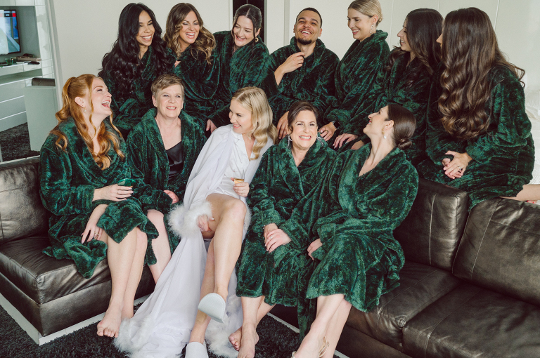 I've photographed multiple of Chris' best friends weddings several years ago. One couple at Tribeca Rooftop NY, another couple at Oheka Castle NY and few other friends at Long Island. So Chris knew when he was going to get married he would hire me. Few years later I get an email from Chris regarding his wedding. These are my dream ideal clients, because they know they will be hiring me even before they meet with me! After a quick phone call, Kaci and Chris booked and their engagement session date was set. We went to Orchard St in NYC where they used to live, walked around their old neighborhood while getting some engagement pics. Kaci and Chris' wedding at The Standard High Line, NY on April 22, 2023. It was raining for the whole week prior to Kaci and Chris wedding day making me bit worried but rain stopped on the morning of Kaci and Chris' wedding at The Standard High Line, NY. Kaci and Chris each got their own hotel rooms to get ready. With quite a big bridal party 10 bridesmaids and 10 groomsmen Kaci and Chris popped champagne bottles. With champagne glasses in their hands Kaci and her brides people laughed as they got their MUAH done by Face Time Beauty at The Standard High Line, NY. And Chris along with his groomsmen got ready in their very retro "Mad Men" vibe room fooling and goofing around till the ceremony at The Standard High Line, NY. Kaci and Chris wedding was held at The High Line Room and Terrace which overlooks The High Line, NY. Weather was gorgeous and I was excited to take Kaci and Chris to The High Line for their wedding portraits but unfortunately during their wedding ceremony at The High Line Room it started pouring! They say it's good luck when it rains on your wedding day, right! Unfortunately, going to The High Line for photos was no go, so backup was at The Terrace where the cocktail hour was going on and which was not even that big of a space. But with help of everyone I managed to get 22 people group photo done on The Terrace while the cocktail hour was going on and all the family formal photos as well as all the bridal party pairs. with only few minutes till Kaci and Chris' wedding reception at The High Line Room, we went up to The Top of Standard for Kaci and Chris' wedding portraits. Working super fast I managed to get good enough amount of wedding portraits of just Kaci and Chris. Music by Jack from LJDJ was playing, Kaci and Chris' wedding reception at The High Line Room at The Standard Hotel High Line NY was about to begin. Kaci and Chris' wedding reception at The Standard High Line was on fire from start to the last second of the evening. It was pouring outside, young people didn't seem to care it was raining and congregated the streets of Meatpacking District while I was weaving through the crowd of party goers to get home as quickly as possible. The night was just starting for them and I was ready for bed. Kaci and Chris' The High Line Room and Terrace, The Standard High Line, NY wedding documented by by Karis | Hey Karis | Catskills, Hudson Valley NY, elopement and wedding photographer | Brooklyn NY elopement and wedding photographer | Manhattan NY elopement and wedding photographer | Hey Karis is fun documentary wedding and elopement photographer.
