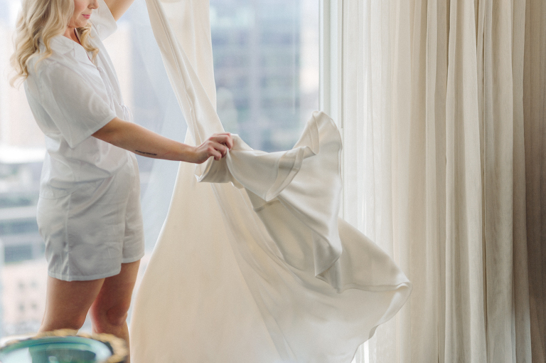 I've photographed multiple of Chris' best friends weddings several years ago. One couple at Tribeca Rooftop NY, another couple at Oheka Castle NY and few other friends at Long Island. So Chris knew when he was going to get married he would hire me. Few years later I get an email from Chris regarding his wedding. These are my dream ideal clients, because they know they will be hiring me even before they meet with me! After a quick phone call, Kaci and Chris booked and their engagement session date was set. We went to Orchard St in NYC where they used to live, walked around their old neighborhood while getting some engagement pics. Kaci and Chris' wedding at The Standard High Line, NY on April 22, 2023. It was raining for the whole week prior to Kaci and Chris wedding day making me bit worried but rain stopped on the morning of Kaci and Chris' wedding at The Standard High Line, NY. Kaci and Chris each got their own hotel rooms to get ready. With quite a big bridal party 10 bridesmaids and 10 groomsmen Kaci and Chris popped champagne bottles. With champagne glasses in their hands Kaci and her brides people laughed as they got their MUAH done by Face Time Beauty at The Standard High Line, NY. And Chris along with his groomsmen got ready in their very retro "Mad Men" vibe room fooling and goofing around till the ceremony at The Standard High Line, NY. Kaci and Chris wedding was held at The High Line Room and Terrace which overlooks The High Line, NY. Weather was gorgeous and I was excited to take Kaci and Chris to The High Line for their wedding portraits but unfortunately during their wedding ceremony at The High Line Room it started pouring! They say it's good luck when it rains on your wedding day, right! Unfortunately, going to The High Line for photos was no go, so backup was at The Terrace where the cocktail hour was going on and which was not even that big of a space. But with help of everyone I managed to get 22 people group photo done on The Terrace while the cocktail hour was going on and all the family formal photos as well as all the bridal party pairs. with only few minutes till Kaci and Chris' wedding reception at The High Line Room, we went up to The Top of Standard for Kaci and Chris' wedding portraits. Working super fast I managed to get good enough amount of wedding portraits of just Kaci and Chris. Music by Jack from LJDJ was playing, Kaci and Chris' wedding reception at The High Line Room at The Standard Hotel High Line NY was about to begin. Kaci and Chris' wedding reception at The Standard High Line was on fire from start to the last second of the evening. It was pouring outside, young people didn't seem to care it was raining and congregated the streets of Meatpacking District while I was weaving through the crowd of party goers to get home as quickly as possible. The night was just starting for them and I was ready for bed. Kaci and Chris' The High Line Room and Terrace, The Standard High Line, NY wedding documented by by Karis | Hey Karis | Catskills, Hudson Valley NY, elopement and wedding photographer | Brooklyn NY elopement and wedding photographer | Manhattan NY elopement and wedding photographer | Hey Karis is fun documentary wedding and elopement photographer.
