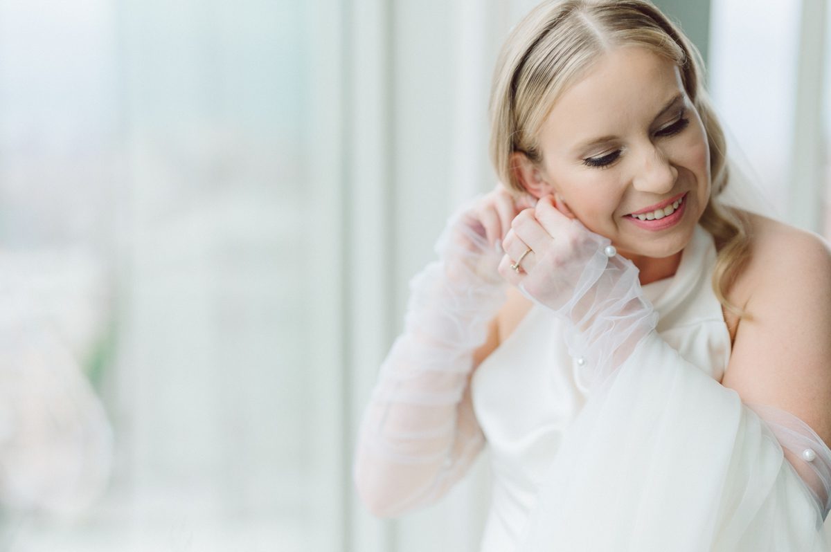 I've photographed multiple of Chris' best friends weddings several years ago. One couple at Tribeca Rooftop NY, another couple at Oheka Castle NY and few other friends at Long Island. So Chris knew when he was going to get married he would hire me. Few years later I get an email from Chris regarding his wedding. These are my dream ideal clients, because they know they will be hiring me even before they meet with me! After a quick phone call, Kaci and Chris booked and their engagement session date was set. We went to Orchard St in NYC where they used to live, walked around their old neighborhood while getting some engagement pics. Kaci and Chris' wedding at The Standard High Line, NY on April 22, 2023. It was raining for the whole week prior to Kaci and Chris wedding day making me bit worried but rain stopped on the morning of Kaci and Chris' wedding at The Standard High Line, NY. Kaci and Chris each got their own hotel rooms to get ready. With quite a big bridal party 10 bridesmaids and 10 groomsmen Kaci and Chris popped champagne bottles. With champagne glasses in their hands Kaci and her brides people laughed as they got their MUAH done by Face Time Beauty at The Standard High Line, NY. And Chris along with his groomsmen got ready in their very retro "Mad Men" vibe room fooling and goofing around till the ceremony at The Standard High Line, NY. Kaci and Chris wedding was held at The High Line Room and Terrace which overlooks The High Line, NY. Weather was gorgeous and I was excited to take Kaci and Chris to The High Line for their wedding portraits but unfortunately during their wedding ceremony at The High Line Room it started pouring! They say it's good luck when it rains on your wedding day, right! Unfortunately, going to The High Line for photos was no go, so backup was at The Terrace where the cocktail hour was going on and which was not even that big of a space. But with help of everyone I managed to get 22 people group photo done on The Terrace while the cocktail hour was going on and all the family formal photos as well as all the bridal party pairs. with only few minutes till Kaci and Chris' wedding reception at The High Line Room, we went up to The Top of Standard for Kaci and Chris' wedding portraits. Working super fast I managed to get good enough amount of wedding portraits of just Kaci and Chris. Music by Jack from LJDJ was playing, Kaci and Chris' wedding reception at The High Line Room at The Standard Hotel High Line NY was about to begin. Kaci and Chris' wedding reception at The Standard High Line was on fire from start to the last second of the evening. It was pouring outside, young people didn't seem to care it was raining and congregated the streets of Meatpacking District while I was weaving through the crowd of party goers to get home as quickly as possible. The night was just starting for them and I was ready for bed. Kaci and Chris' The High Line Room and Terrace, The Standard High Line, NY wedding documented by by Karis | Hey Karis | Catskills, Hudson Valley NY, elopement and wedding photographer | Brooklyn NY elopement and wedding photographer | Manhattan NY elopement and wedding photographer | Hey Karis is fun documentary wedding and elopement photographer.