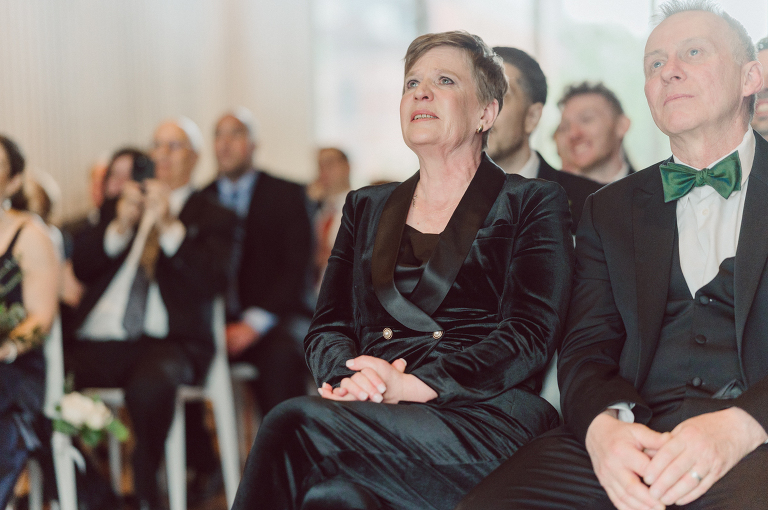 I've photographed multiple of Chris' best friends weddings several years ago. One couple at Tribeca Rooftop NY, another couple at Oheka Castle NY and few other friends at Long Island. So Chris knew when he was going to get married he would hire me. Few years later I get an email from Chris regarding his wedding. These are my dream ideal clients, because they know they will be hiring me even before they meet with me! After a quick phone call, Kaci and Chris booked and their engagement session date was set. We went to Orchard St in NYC where they used to live, walked around their old neighborhood while getting some engagement pics. Kaci and Chris' wedding at The Standard High Line, NY on April 22, 2023. It was raining for the whole week prior to Kaci and Chris wedding day making me bit worried but rain stopped on the morning of Kaci and Chris' wedding at The Standard High Line, NY. Kaci and Chris each got their own hotel rooms to get ready. With quite a big bridal party 10 bridesmaids and 10 groomsmen Kaci and Chris popped champagne bottles. With champagne glasses in their hands Kaci and her brides people laughed as they got their MUAH done by Face Time Beauty at The Standard High Line, NY. And Chris along with his groomsmen got ready in their very retro "Mad Men" vibe room fooling and goofing around till the ceremony at The Standard High Line, NY. Kaci and Chris wedding was held at The High Line Room and Terrace which overlooks The High Line, NY. Weather was gorgeous and I was excited to take Kaci and Chris to The High Line for their wedding portraits but unfortunately during their wedding ceremony at The High Line Room it started pouring! They say it's good luck when it rains on your wedding day, right! Unfortunately, going to The High Line for photos was no go, so backup was at The Terrace where the cocktail hour was going on and which was not even that big of a space. But with help of everyone I managed to get 22 people group photo done on The Terrace while the cocktail hour was going on and all the family formal photos as well as all the bridal party pairs. with only few minutes till Kaci and Chris' wedding reception at The High Line Room, we went up to The Top of Standard for Kaci and Chris' wedding portraits. Working super fast I managed to get good enough amount of wedding portraits of just Kaci and Chris. Music by Jack from LJDJ was playing, Kaci and Chris' wedding reception at The High Line Room at The Standard Hotel High Line NY was about to begin. Kaci and Chris' wedding reception at The Standard High Line was on fire from start to the last second of the evening. It was pouring outside, young people didn't seem to care it was raining and congregated the streets of Meatpacking District while I was weaving through the crowd of party goers to get home as quickly as possible. The night was just starting for them and I was ready for bed. Kaci and Chris' The High Line Room and Terrace, The Standard High Line, NY wedding documented by by Karis | Hey Karis | Catskills, Hudson Valley NY, elopement and wedding photographer | Brooklyn NY elopement and wedding photographer | Manhattan NY elopement and wedding photographer | Hey Karis is fun documentary wedding and elopement photographer.
