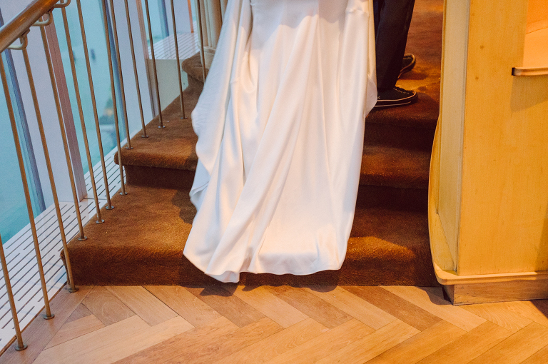 I've photographed multiple of Chris' best friends weddings several years ago. One couple at Tribeca Rooftop NY, another couple at Oheka Castle NY and few other friends at Long Island. So Chris knew when he was going to get married he would hire me. Few years later I get an email from Chris regarding his wedding. These are my dream ideal clients, because they know they will be hiring me even before they meet with me! After a quick phone call, Kaci and Chris booked and their engagement session date was set. We went to Orchard St in NYC where they used to live, walked around their old neighborhood while getting some engagement pics. Kaci and Chris' wedding at The Standard High Line, NY on April 22, 2023. It was raining for the whole week prior to Kaci and Chris wedding day making me bit worried but rain stopped on the morning of Kaci and Chris' wedding at The Standard High Line, NY. Kaci and Chris each got their own hotel rooms to get ready. With quite a big bridal party 10 bridesmaids and 10 groomsmen Kaci and Chris popped champagne bottles. With champagne glasses in their hands Kaci and her brides people laughed as they got their MUAH done by Face Time Beauty at The Standard High Line, NY. And Chris along with his groomsmen got ready in their very retro "Mad Men" vibe room fooling and goofing around till the ceremony at The Standard High Line, NY. Kaci and Chris wedding was held at The High Line Room and Terrace which overlooks The High Line, NY. Weather was gorgeous and I was excited to take Kaci and Chris to The High Line for their wedding portraits but unfortunately during their wedding ceremony at The High Line Room it started pouring! They say it's good luck when it rains on your wedding day, right! Unfortunately, going to The High Line for photos was no go, so backup was at The Terrace where the cocktail hour was going on and which was not even that big of a space. But with help of everyone I managed to get 22 people group photo done on The Terrace while the cocktail hour was going on and all the family formal photos as well as all the bridal party pairs. with only few minutes till Kaci and Chris' wedding reception at The High Line Room, we went up to The Top of Standard for Kaci and Chris' wedding portraits. Working super fast I managed to get good enough amount of wedding portraits of just Kaci and Chris. Music by Jack from LJDJ was playing, Kaci and Chris' wedding reception at The High Line Room at The Standard Hotel High Line NY was about to begin. Kaci and Chris' wedding reception at The Standard High Line was on fire from start to the last second of the evening. It was pouring outside, young people didn't seem to care it was raining and congregated the streets of Meatpacking District while I was weaving through the crowd of party goers to get home as quickly as possible. The night was just starting for them and I was ready for bed. Kaci and Chris' The High Line Room and Terrace, The Standard High Line, NY wedding documented by by Karis | Hey Karis | Catskills, Hudson Valley NY, elopement and wedding photographer | Brooklyn NY elopement and wedding photographer | Manhattan NY elopement and wedding photographer | Hey Karis is fun documentary wedding and elopement photographer.