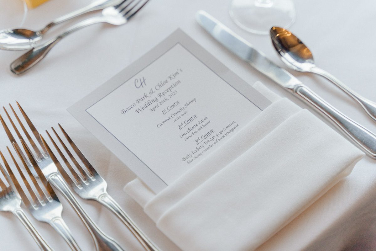 Chloe and Bosco are one of the sweetest couple!!! Well mannered, kind, sweet, considerate so I was extra excited for Chloe and Bosco's wedding at The Chart House. Chloe and Bosco both got ready at Chole's parents house in Oradell NJ where both sets of parents were all gathered. With no bridal party Chloe and Bosco had a quiet wedding morning. Midway through the morning prep, it started raining outside and did not look like we will be going outside for photos anytime soon or even till evening at Weehawken. With wishful mind of clear sky later, we got photos with family, parents and the couple at Chole's parent's house before leaving for Chloe and Bosco's wedding ceremony at St. Michaels Church in Fort Lee, NJ. St. Michales Church is small cute Korean Catholic church in Fort Lee, NJ where Chloe and Bosco belongs to. We can hear the rain falling down harder while getting group and family formal photos at St. Michaels Church before heading to Chart House in Weehawken NJ for Chloe and Bosco's intimate wedding reception. By the time we were in the car to drive over to Chart House, it was POURING. Chart House was busy with weekend customers enjoying the restaurant and they had three events going on upstairs! The entrance to Chart House was crowded with people coming and leaving waiting for the valet to bring their cars. Chloe and Bosco with help of their friends DIYed lots of wedding decor, music and games/entertainment during their wedding reception at Chart House. My heart really belongs to these small and intimate weddings where the couple focuses on them and what is really important to them instead of a big wedding celebration to show off of copy what they saw on social media. Sweet and lovely intimate wedding of Chloe and Bosco at Chart House Weehawken NJ wedding documented by by Karis | Hey Karis | Catskills, Hudson Valley NY elopement and wedding photographer | Brooklyn NY elopement and wedding photographer | Manhattan NY elopement and wedding photographer | Hey Karis is fun documentary wedding and elopement photographer.
