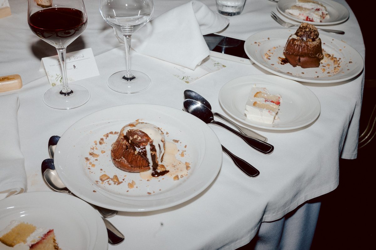 Chloe and Bosco are one of the sweetest couple!!! Well mannered, kind, sweet, considerate so I was extra excited for Chloe and Bosco's wedding at The Chart House. Chloe and Bosco both got ready at Chole's parents house in Oradell NJ where both sets of parents were all gathered. With no bridal party Chloe and Bosco had a quiet wedding morning. Midway through the morning prep, it started raining outside and did not look like we will be going outside for photos anytime soon or even till evening at Weehawken. With wishful mind of clear sky later, we got photos with family, parents and the couple at Chole's parent's house before leaving for Chloe and Bosco's wedding ceremony at St. Michaels Church in Fort Lee, NJ. St. Michales Church is small cute Korean Catholic church in Fort Lee, NJ where Chloe and Bosco belongs to. We can hear the rain falling down harder while getting group and family formal photos at St. Michaels Church before heading to Chart House in Weehawken NJ for Chloe and Bosco's intimate wedding reception. By the time we were in the car to drive over to Chart House, it was POURING. Chart House was busy with weekend customers enjoying the restaurant and they had three events going on upstairs! The entrance to Chart House was crowded with people coming and leaving waiting for the valet to bring their cars. Chloe and Bosco with help of their friends DIYed lots of wedding decor, music and games/entertainment during their wedding reception at Chart House. My heart really belongs to these small and intimate weddings where the couple focuses on them and what is really important to them instead of a big wedding celebration to show off of copy what they saw on social media. Sweet and lovely intimate wedding of Chloe and Bosco at Chart House Weehawken NJ wedding documented by by Karis | Hey Karis | Catskills, Hudson Valley NY elopement and wedding photographer | Brooklyn NY elopement and wedding photographer | Manhattan NY elopement and wedding photographer | Hey Karis is fun documentary wedding and elopement photographer.
