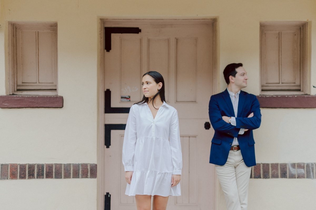 Washington Square Park along with University St as well as Washington Mews were all very quiet and empty Saturday morning. Unusually empty and that is when I realized NYU along with all colleges/universities were out for the summer which means all the students left NYC for the summer. Also meant we had the luxury of having the whole Washington Mews to ourselves during Renee and Sam's engagement session. We walked up and down the cobble stone street of Washington Mews choosing which backdrop, which colorful brick wall and which rustic door we liked best. Roses and green vines covered the walls of Washington Mews making us feel like as if we were in streets of Europe. Washington Mews is truly a gem in this concrete jungle called Manhattan. Renee and Sam's Washington Mews NY Engagement Session documented by by Karis | Hey Karis | Catskills, Hudson Valley NY elopement and wedding photographer | Brooklyn NY elopement and wedding photographer | Manhattan NY elopement and wedding photographer | Hey Karis is fun documentary wedding and elopement photographer.
