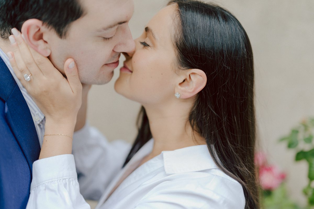 Washington Square Park along with University St as well as Washington Mews were all very quiet and empty Saturday morning. Unusually empty and that is when I realized NYU along with all colleges/universities were out for the summer which means all the students left NYC for the summer. Also meant we had the luxury of having the whole Washington Mews to ourselves during Renee and Sam's engagement session. We walked up and down the cobble stone street of Washington Mews choosing which backdrop, which colorful brick wall and which rustic door we liked best. Roses and green vines covered the walls of Washington Mews making us feel like as if we were in streets of Europe. Washington Mews is truly a gem in this concrete jungle called Manhattan. Renee and Sam's Washington Mews NY Engagement Session documented by by Karis | Hey Karis | Catskills, Hudson Valley NY elopement and wedding photographer | Brooklyn NY elopement and wedding photographer | Manhattan NY elopement and wedding photographer | Hey Karis is fun documentary wedding and elopement photographer.
