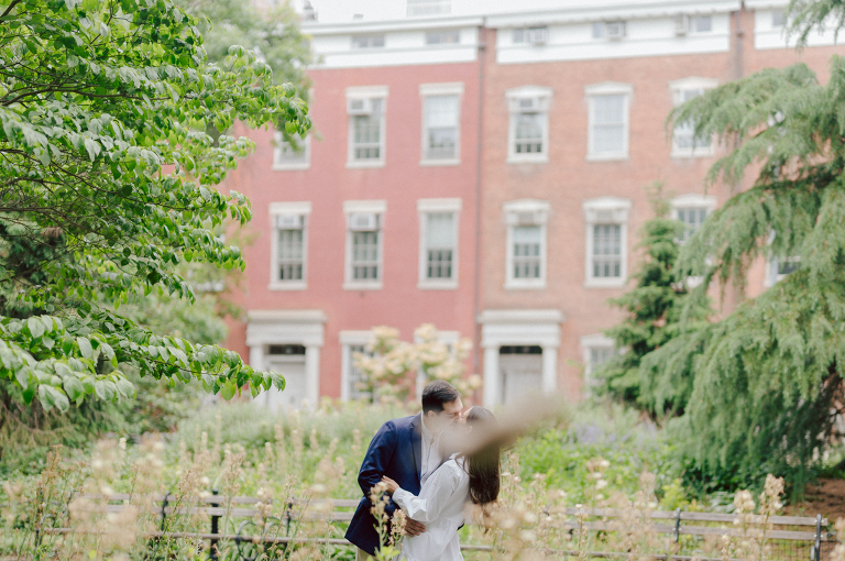 Washington Square Park along with University St as well as Washington Mews were all very quiet and empty Saturday morning. Unusually empty and that is when I realized NYU along with all colleges/universities were out for the summer which means all the students left NYC for the summer. Also meant we had the luxury of having the whole Washington Mews to ourselves during Renee and Sam's engagement session. We walked up and down the cobble stone street of Washington Mews choosing which backdrop, which colorful brick wall and which rustic door we liked best. Roses and green vines covered the walls of Washington Mews making us feel like as if we were in streets of Europe. Washington Mews is truly a gem in this concrete jungle called Manhattan. Renee and Sam's Washington Mews NY Engagement Session documented by by Karis | Hey Karis | Catskills, Hudson Valley NY elopement and wedding photographer | Brooklyn NY elopement and wedding photographer | Manhattan NY elopement and wedding photographer | Hey Karis is fun documentary wedding and elopement photographer.
