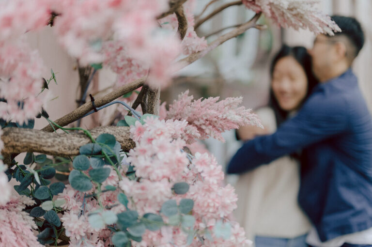 As I was about to walk into Ridgewood Coffee Company on Ridgewood Ave I saw Jane and Kevin walking out of their car. Kevin's face brightened up into big smile and came over to give me a hug then Jane turning and saw me. Jane and Kevin are one of those people that really appreciates me, big huge fans of my work and I am so honored to have earned their trust and love. Jane and Kevin are my people and they are my tribe. I love love shooting at small downtown because of it's variety of backdrops, every corner is different, new, exciting. It was such a joy wandering around downtown Ridgewood with two people that would do anything that I tell them to. Jane and Kevin were such a delightful people, they make me laugh and smile if I think of them. I can't wait to celebrate with them again on their wedding at Tides Estate till then these adorable and fun engagement photo will have to do. Jane and Kevin's Downtown Ridgewood NJ egagement Session documented by by Karis | Hey Karis | Catskills, Hudson Valley NY elopement and wedding photographer | Brooklyn NY elopement and wedding photographer | Manhattan NY elopement and wedding photographer | Hey Karis is fun documentary wedding and elopement photographer.