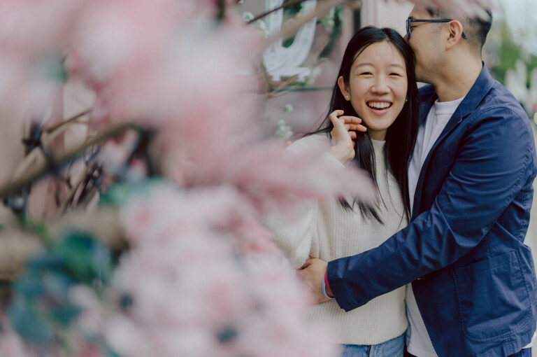 As I was about to walk into Ridgewood Coffee Company on Ridgewood Ave I saw Jane and Kevin walking out of their car. Kevin's face brightened up into big smile and came over to give me a hug then Jane turning and saw me. Jane and Kevin are one of those people that really appreciates me, big huge fans of my work and I am so honored to have earned their trust and love. Jane and Kevin are my people and they are my tribe. I love love shooting at small downtown because of it's variety of backdrops, every corner is different, new, exciting. It was such a joy wandering around downtown Ridgewood with two people that would do anything that I tell them to. Jane and Kevin were such a delightful people, they make me laugh and smile if I think of them. I can't wait to celebrate with them again on their wedding at Tides Estate till then these adorable and fun engagement photo will have to do. Jane and Kevin's Downtown Ridgewood NJ egagement Session documented by by Karis | Hey Karis | Catskills, Hudson Valley NY elopement and wedding photographer | Brooklyn NY elopement and wedding photographer | Manhattan NY elopement and wedding photographer | Hey Karis is fun documentary wedding and elopement photographer.