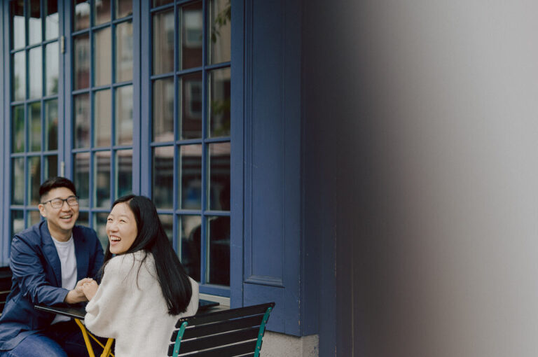 As I was about to walk into Ridgewood Coffee Company on Ridgewood Ave I saw Jane and Kevin walking out of their car. Kevin's face brightened up into big smile and came over to give me a hug then Jane turning and saw me. Jane and Kevin are one of those people that really appreciates me, big huge fans of my work and I am so honored to have earned their trust and love. Jane and Kevin are my people and they are my tribe. I love love shooting at small downtown because of it's variety of backdrops, every corner is different, new, exciting. It was such a joy wandering around downtown Ridgewood with two people that would do anything that I tell them to. Jane and Kevin were such a delightful people, they make me laugh and smile if I think of them. I can't wait to celebrate with them again on their wedding at Tides Estate till then these adorable and fun engagement photo will have to do. Jane and Kevin's Downtown Ridgewood NJ egagement Session documented by by Karis | Hey Karis | Catskills, Hudson Valley NY elopement and wedding photographer | Brooklyn NY elopement and wedding photographer | Manhattan NY elopement and wedding photographer | Hey Karis is fun documentary wedding and elopement photographer.