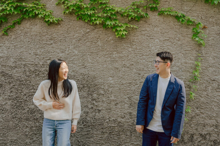 As I was about to walk into Ridgewood Coffee Company on Ridgewood Ave I saw Jane and Kevin walking out of their car. Kevin's face brightened up into big smile and came over to give me a hug then Jane turning and saw me. Jane and Kevin are one of those people that really appreciates me, big huge fans of my work and I am so honored to have earned their trust and love. Jane and Kevin are my people and they are my tribe. I love love shooting at small downtown because of it's variety of backdrops, every corner is different, new, exciting. It was such a joy wandering around downtown Ridgewood with two people that would do anything that I tell them to. Jane and Kevin were such a delightful people, they make me laugh and smile if I think of them. I can't wait to celebrate with them again on their wedding at Tides Estate till then these adorable and fun engagement photo will have to do. Jane and Kevin's Downtown Ridgewood NJ egagement Session documented by by Karis | Hey Karis | Catskills, Hudson Valley NY elopement and wedding photographer | Brooklyn NY elopement and wedding photographer | Manhattan NY elopement and wedding photographer | Hey Karis is fun documentary wedding and elopement photographer.