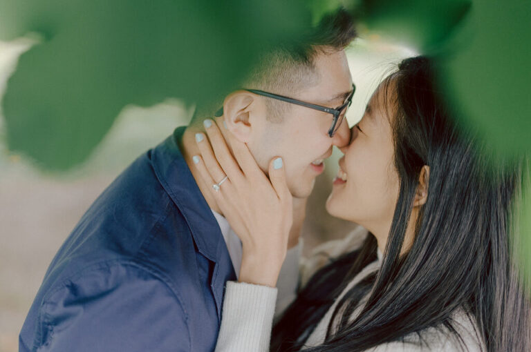 As I was about to walk into Ridgewood Coffee Company on Ridgewood Ave I saw Jane and Kevin walking out of their car. Kevin's face brightened up into big smile and came over to give me a hug then Jane turning and saw me. Jane and Kevin are one of those people that really appreciates me, big huge fans of my work and I am so honored to have earned their trust and love. Jane and Kevin are my people and they are my tribe. I love love shooting at small downtown because of it's variety of backdrops, every corner is different, new, exciting. It was such a joy wandering around downtown Ridgewood with two people that would do anything that I tell them to. Jane and Kevin were such a delightful people, they make me laugh and smile if I think of them. I can't wait to celebrate with them again on their wedding at Tides Estate till then these adorable and fun engagement photo will have to do. Jane and Kevin's Downtown Ridgewood NJ egagement Session documented by by Karis | Hey Karis | Catskills, Hudson Valley NY elopement and wedding photographer | Brooklyn NY elopement and wedding photographer | Manhattan NY elopement and wedding photographer | Hey Karis is fun documentary wedding and elopement photographer.