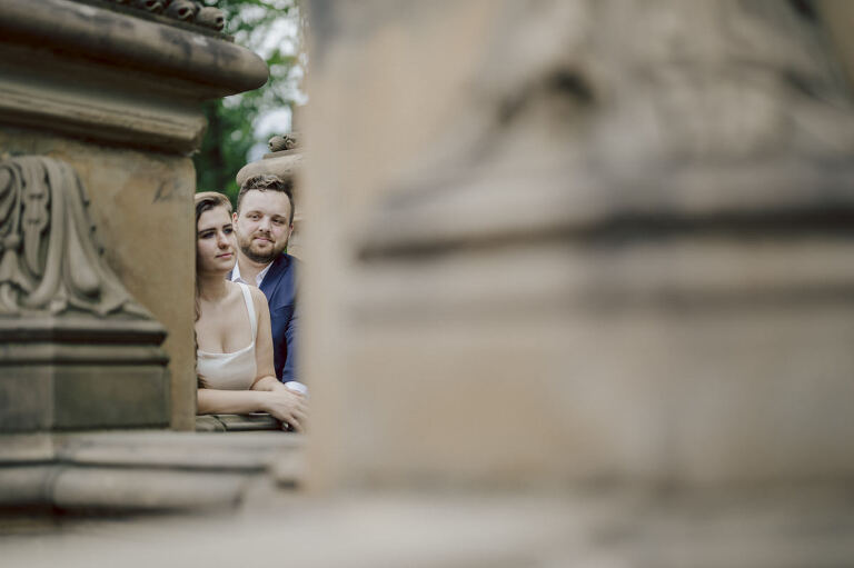 After trying to dodge multiple rains, scattered thunderstorms we met by Bethesda Fountain in Central Park NY. I saw Izzy and Brendan standing near crowded Bethesda Arcade. Dressed for their engagement session I took Izzy and Brendan to quiet corner of this jam packed Central Park. With maximum humidity in the air Izzy and Brendan was such a troopers in this heavy heat with crazy humidity in the air they smiles, laughed and cursed. The good ol'NY way, together with Izzy and Brendan we were weird, sarcastic, funny walking around Central Park. At some point it actually started drizzling then turned into heavy rain but we took covers under the trees and continued shooting. It was so fun photographing two people who cared less about how they looked in the humidity but just wanted to have fun! Again I love my careless, self loving humans and can't wait for Izzy and Brendan's wedding at Arrow Park this year. Izzy and Brendan's Central Park NY engagement documented by by Karis | Hey Karis | Catskills, Hudson Valley NY elopement and wedding photographer | Brooklyn NY elopement and wedding photographer | Manhattan NY elopement and wedding photographer | Hey Karis is fun documentary wedding and elopement photographer.
