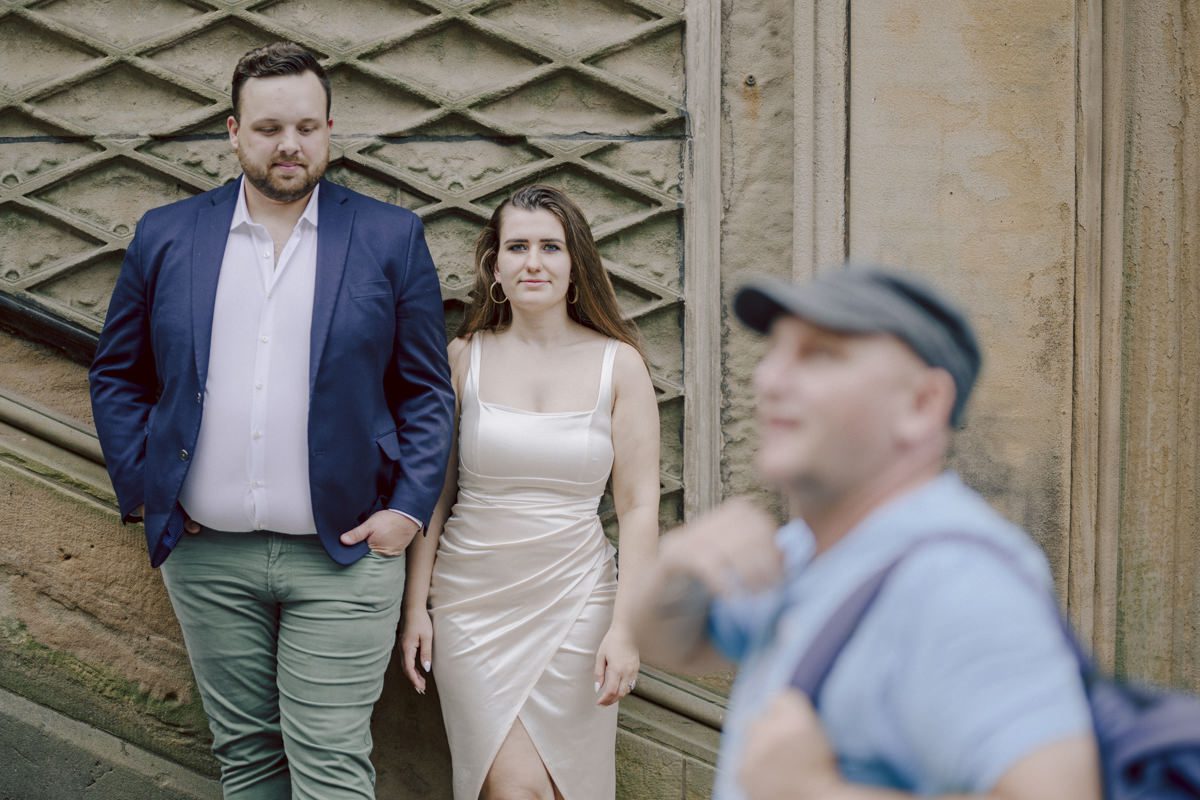 After trying to dodge multiple rains, scattered thunderstorms we met by Bethesda Fountain in Central Park NY. I saw Izzy and Brendan standing near crowded Bethesda Arcade. Dressed for their engagement session I took Izzy and Brendan to quiet corner of this jam packed Central Park. With maximum humidity in the air Izzy and Brendan was such a troopers in this heavy heat with crazy humidity in the air they smiles, laughed and cursed. The good ol'NY way, together with Izzy and Brendan we were weird, sarcastic, funny walking around Central Park. At some point it actually started drizzling then turned into heavy rain but we took covers under the trees and continued shooting. It was so fun photographing two people who cared less about how they looked in the humidity but just wanted to have fun! Again I love my careless, self loving humans and can't wait for Izzy and Brendan's wedding at Arrow Park this year. Izzy and Brendan's Central Park NY engagement documented by by Karis | Hey Karis | Catskills, Hudson Valley NY elopement and wedding photographer | Brooklyn NY elopement and wedding photographer | Manhattan NY elopement and wedding photographer | Hey Karis is fun documentary wedding and elopement photographer.
