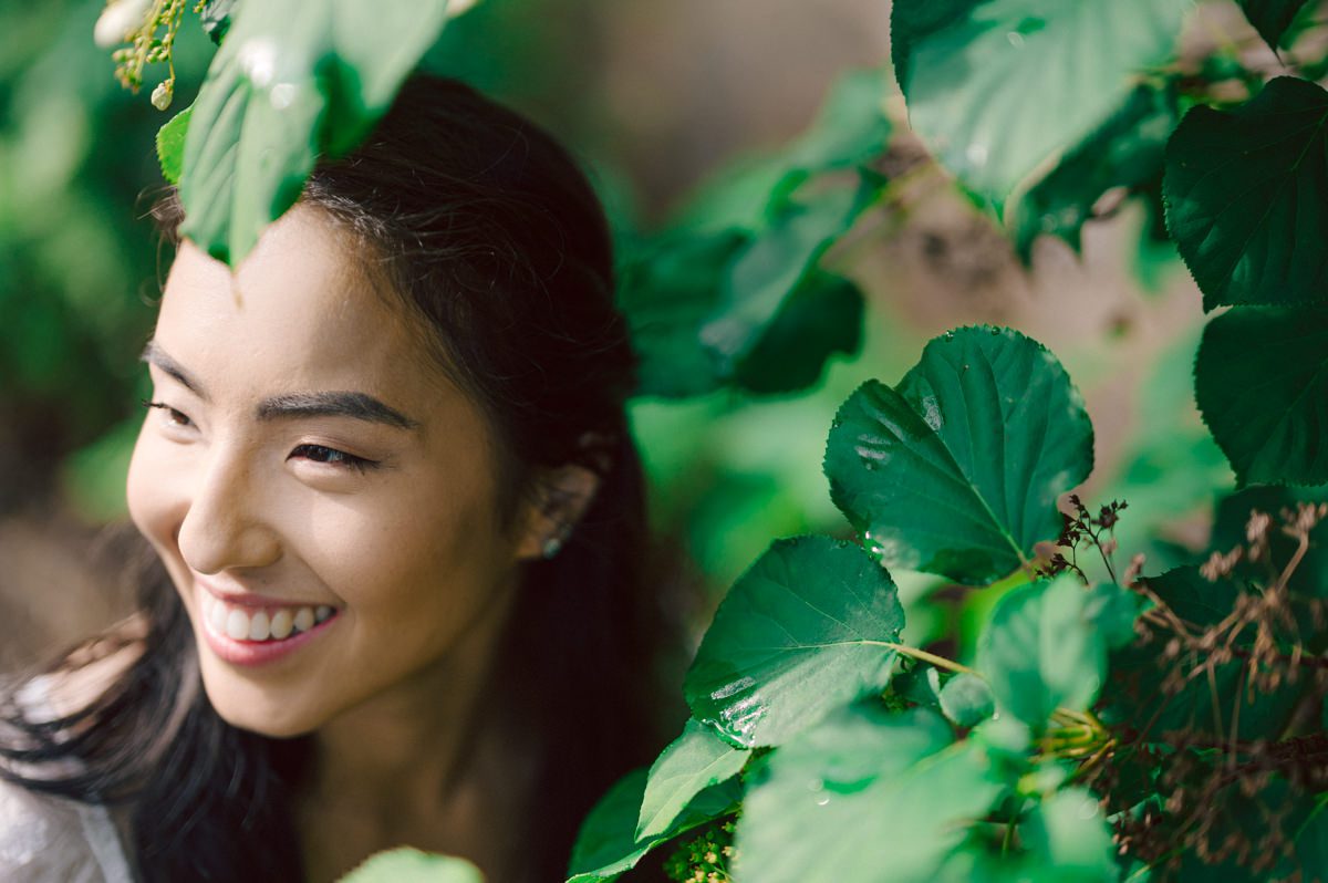 Ari and Kevin reached out with an intimate wedding plans and was pretty much ready to book me as soon as they got on the phone. Most intimate wedding couples opt out of engagement session but Ari knew she wanted an engagement session to celebrate their love before their intimate wedding in August. Ari and Kevin have very active lifestyle where they go climbing, hiking, running, etc...so by default they wanted an outdoor natury engagement session. We chose to meet at the botanical garden. Since we are in the middle of hot summer, we all agreed on early session when the park opened but even than 30mins into the engagement session it got real hot and humid. Ari not so much but Kevin was definitely started sweating. But Ari and Kevin along with their Corgi named Echo did amazing, we had so much fun as you can see from these photos of Ari, Kevin and Echo. Ari and Kevin's Botanical Garden engagement documented by by Karis | Hey Karis | Catskills, Hudson Valley NY elopement and wedding photographer | Brooklyn NY elopement and wedding photographer | Manhattan NY elopement and wedding photographer | Hey Karis is fun documentary wedding and elopement photographer.