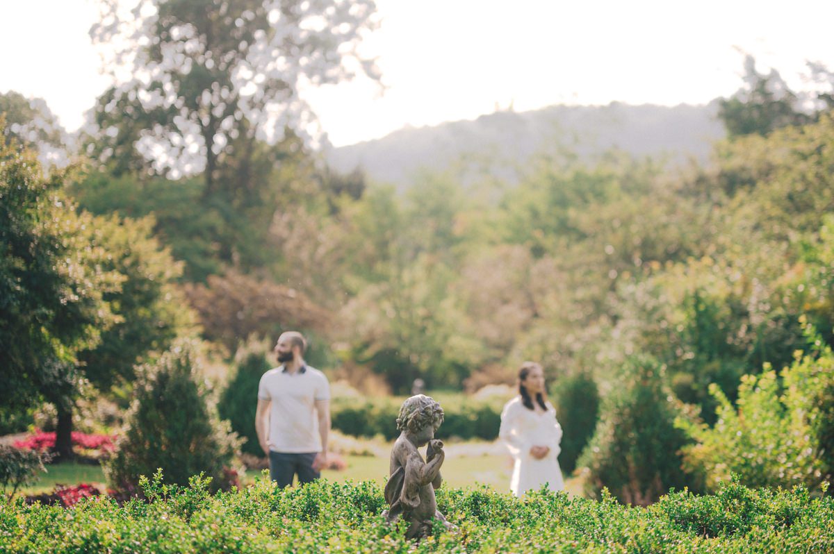 Ari and Kevin reached out with an intimate wedding plans and was pretty much ready to book me as soon as they got on the phone. Most intimate wedding couples opt out of engagement session but Ari knew she wanted an engagement session to celebrate their love before their intimate wedding in August. Ari and Kevin have very active lifestyle where they go climbing, hiking, running, etc...so by default they wanted an outdoor natury engagement session. We chose to meet at the botanical garden. Since we are in the middle of hot summer, we all agreed on early session when the park opened but even than 30mins into the engagement session it got real hot and humid. Ari not so much but Kevin was definitely started sweating. But Ari and Kevin along with their Corgi named Echo did amazing, we had so much fun as you can see from these photos of Ari, Kevin and Echo. Ari and Kevin's Botanical Garden engagement documented by by Karis | Hey Karis | Catskills, Hudson Valley NY elopement and wedding photographer | Brooklyn NY elopement and wedding photographer | Manhattan NY elopement and wedding photographer | Hey Karis is fun documentary wedding and elopement photographer.