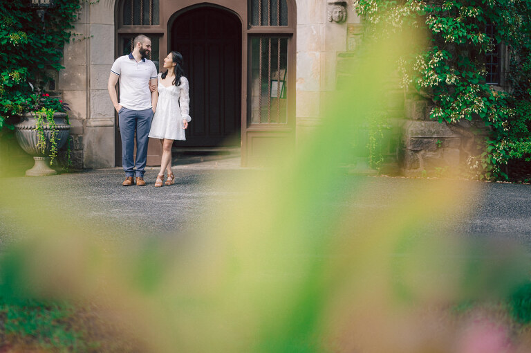 Ari and Kevin reached out with an intimate wedding plans and was pretty much ready to book me as soon as they got on the phone. Most intimate wedding couples opt out of engagement session but Ari knew she wanted an engagement session to celebrate their love before their intimate wedding in August. Ari and Kevin have very active lifestyle where they go climbing, hiking, running, etc...so by default they wanted an outdoor natury engagement session. We chose to meet at the botanical garden. Since we are in the middle of hot summer, we all agreed on early session when the park opened but even than 30mins into the engagement session it got real hot and humid. Ari not so much but Kevin was definitely started sweating. But Ari and Kevin along with their Corgi named Echo did amazing, we had so much fun as you can see from these photos of Ari, Kevin and Echo. Ari and Kevin's Botanical Garden engagement documented by by Karis | Hey Karis | Catskills, Hudson Valley NY elopement and wedding photographer | Brooklyn NY elopement and wedding photographer | Manhattan NY elopement and wedding photographer | Hey Karis is fun documentary wedding and elopement photographer.