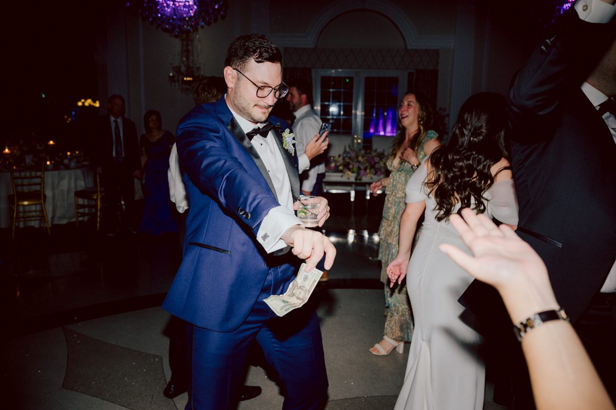 Jackie and Nick the two New Yorkers wanted to get away from busy packed streets of NY and get married in NJ, The Rockleigh NJ. Jackie got ready at her parents house in Hasbrouck Heights in NJ where her mom and bridesmaids showered her with love while they got ready together for her wedding. Nick also got ready at his parents house in Park Ridge NJ. Jackie & Nick got into their limos and drove to the chapel Our Lady of mercy Church in Park Ridge NJ for their wedding ceremony. Jackie and Nick's beautiful wedding ceremony was over at Our Lady of Mercy Church followed by family photos at the church before heading over to The Rockleigh for their wedding reception and to party! The Rockleigh's garden's were beautiful with flowers and perfectly manicured bushes, trees and flowers. I did all of Jackie and Nick's wedding photos at the garden at The Rockleigh including extended family photos, bridal party photos as well as newly weds couple's photos. Then Jackie and Nick joined their guests at their cocktail hour to start their wedding party. Fun and beautiful wedding reception continued till midnight at The Rockleigh. Jackie and Nick's The Rockleigh NJ Wedding documented by by Karis | Hey Karis | Catskills, Hudson Valley NY elopement and wedding photographer | Brooklyn NY elopement and wedding photographer | Manhattan NY elopement and wedding photographer | Hey Karis is fun documentary wedding and elopement photographer.