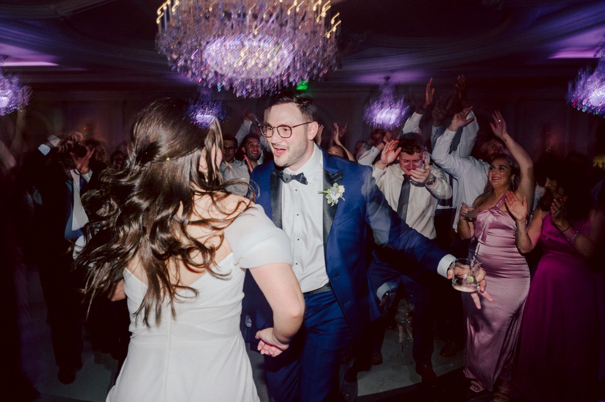 Jackie and Nick the two New Yorkers wanted to get away from busy packed streets of NY and get married in NJ, The Rockleigh NJ. Jackie got ready at her parents house in Hasbrouck Heights in NJ where her mom and bridesmaids showered her with love while they got ready together for her wedding. Nick also got ready at his parents house in Park Ridge NJ. Jackie & Nick got into their limos and drove to the chapel Our Lady of mercy Church in Park Ridge NJ for their wedding ceremony. Jackie and Nick's beautiful wedding ceremony was over at Our Lady of Mercy Church followed by family photos at the church before heading over to The Rockleigh for their wedding reception and to party! The Rockleigh's garden's were beautiful with flowers and perfectly manicured bushes, trees and flowers. I did all of Jackie and Nick's wedding photos at the garden at The Rockleigh including extended family photos, bridal party photos as well as newly weds couple's photos. Then Jackie and Nick joined their guests at their cocktail hour to start their wedding party. Fun and beautiful wedding reception continued till midnight at The Rockleigh. Jackie and Nick's The Rockleigh NJ Wedding documented by by Karis | Hey Karis | Catskills, Hudson Valley NY elopement and wedding photographer | Brooklyn NY elopement and wedding photographer | Manhattan NY elopement and wedding photographer | Hey Karis is fun documentary wedding and elopement photographer.