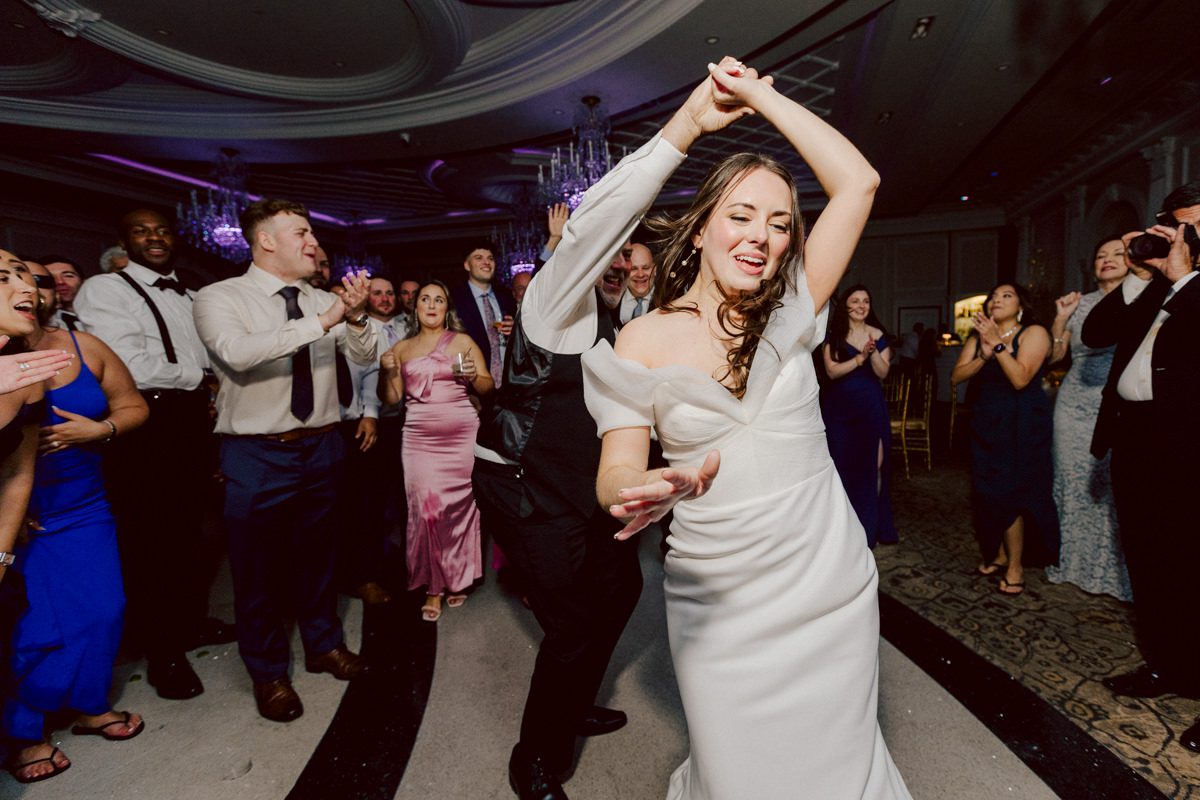 Jackie and Nick the two New Yorkers wanted to get away from busy packed streets of NY and get married in NJ, The Rockleigh NJ. Jackie got ready at her parents house in Hasbrouck Heights in NJ where her mom and bridesmaids showered her with love while they got ready together for her wedding. Nick also got ready at his parents house in Park Ridge NJ. Jackie & Nick got into their limos and drove to the chapel Our Lady of mercy Church in Park Ridge NJ for their wedding ceremony. Jackie and Nick's beautiful wedding ceremony was over at Our Lady of Mercy Church followed by family photos at the church before heading over to The Rockleigh for their wedding reception and to party! The Rockleigh's garden's were beautiful with flowers and perfectly manicured bushes, trees and flowers. I did all of Jackie and Nick's wedding photos at the garden at The Rockleigh including extended family photos, bridal party photos as well as newly weds couple's photos. Then Jackie and Nick joined their guests at their cocktail hour to start their wedding party. Fun and beautiful wedding reception continued till midnight at The Rockleigh. Jackie and Nick's The Rockleigh NJ Wedding documented by by Karis | Hey Karis | Catskills, Hudson Valley NY elopement and wedding photographer | Brooklyn NY elopement and wedding photographer | Manhattan NY elopement and wedding photographer | Hey Karis is fun documentary wedding and elopement photographer.