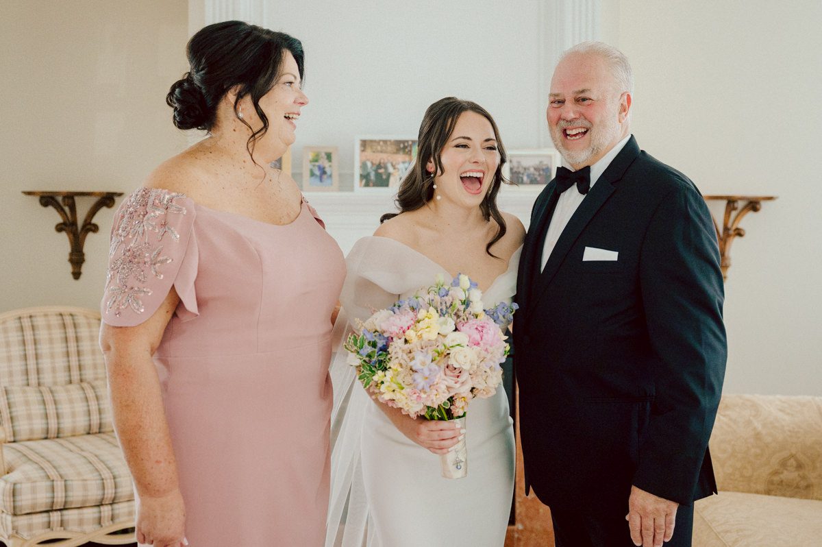 Jackie and Nick the two New Yorkers wanted to get away from busy packed streets of NY and get married in NJ, The Rockleigh NJ. Jackie got ready at her parents house in Hasbrouck Heights in NJ where her mom and bridesmaids showered her with love while they got ready together for her wedding. Nick also got ready at his parents house in Park Ridge NJ. Jackie & Nick got into their limos and drove to the chapel Our Lady of mercy Church in Park Ridge NJ for their wedding ceremony. Jackie and Nick's beautiful wedding ceremony was over at Our Lady of Mercy Church followed by family photos at the church before heading over to The Rockleigh for their wedding reception and to party! The Rockleigh's garden's were beautiful with flowers and perfectly manicured bushes, trees and flowers. I did all of Jackie and Nick's wedding photos at the garden at The Rockleigh including extended family photos, bridal party photos as well as newly weds couple's photos. Then Jackie and Nick joined their guests at their cocktail hour to start their wedding party. Fun and beautiful wedding reception continued till midnight at The Rockleigh. Jackie and Nick's The Rockleigh NJ Wedding documented by by Karis | Hey Karis | Catskills, Hudson Valley NY elopement and wedding photographer | Brooklyn NY elopement and wedding photographer | Manhattan NY elopement and wedding photographer | Hey Karis is fun documentary wedding and elopement photographer.