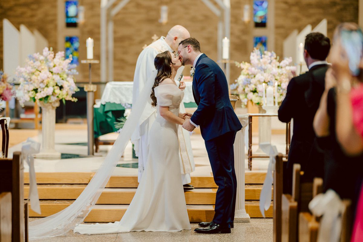 Jackie and Nick the two New Yorkers wanted to get away from busy packed streets of NY and get married in NJ, The Rockleigh NJ. Jackie got ready at her parents house in Hasbrouck Heights in NJ where her mom and bridesmaids showered her with love while they got ready together for her wedding. Nick also got ready at his parents house in Park Ridge NJ. Jackie & Nick got into their limos and drove to the chapel Our Lady of mercy Church in Park Ridge NJ for their wedding ceremony. Jackie and Nick's beautiful wedding ceremony was over at Our Lady of Mercy Church followed by family photos at the church before heading over to The Rockleigh for their wedding reception and to party! The Rockleigh's garden's were beautiful with flowers and perfectly manicured bushes, trees and flowers. I did all of Jackie and Nick's wedding photos at the garden at The Rockleigh including extended family photos, bridal party photos as well as newly weds couple's photos. Then Jackie and Nick joined their guests at their cocktail hour to start their wedding party. Fun and beautiful wedding reception continued till midnight at The Rockleigh. Jackie and Nick's The Rockleigh NJ Wedding documented by by Karis | Hey Karis | Catskills, Hudson Valley NY elopement and wedding photographer | Brooklyn NY elopement and wedding photographer | Manhattan NY elopement and wedding photographer | Hey Karis is fun documentary wedding and elopement photographer.
