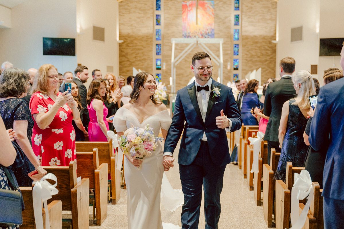 Jackie and Nick the two New Yorkers wanted to get away from busy packed streets of NY and get married in NJ, The Rockleigh NJ. Jackie got ready at her parents house in Hasbrouck Heights in NJ where her mom and bridesmaids showered her with love while they got ready together for her wedding. Nick also got ready at his parents house in Park Ridge NJ. Jackie & Nick got into their limos and drove to the chapel Our Lady of mercy Church in Park Ridge NJ for their wedding ceremony. Jackie and Nick's beautiful wedding ceremony was over at Our Lady of Mercy Church followed by family photos at the church before heading over to The Rockleigh for their wedding reception and to party! The Rockleigh's garden's were beautiful with flowers and perfectly manicured bushes, trees and flowers. I did all of Jackie and Nick's wedding photos at the garden at The Rockleigh including extended family photos, bridal party photos as well as newly weds couple's photos. Then Jackie and Nick joined their guests at their cocktail hour to start their wedding party. Fun and beautiful wedding reception continued till midnight at The Rockleigh. Jackie and Nick's The Rockleigh NJ Wedding documented by by Karis | Hey Karis | Catskills, Hudson Valley NY elopement and wedding photographer | Brooklyn NY elopement and wedding photographer | Manhattan NY elopement and wedding photographer | Hey Karis is fun documentary wedding and elopement photographer.