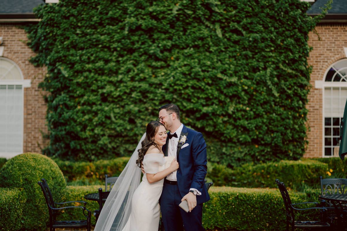 Jackie and Nick the two New Yorkers wanted to get away from busy packed streets of NY and get married in NJ, The Rockleigh NJ. Jackie got ready at her parents house in Hasbrouck Heights in NJ where her mom and bridesmaids showered her with love while they got ready together for her wedding. Nick also got ready at his parents house in Park Ridge NJ. Jackie & Nick got into their limos and drove to the chapel Our Lady of mercy Church in Park Ridge NJ for their wedding ceremony. Jackie and Nick's beautiful wedding ceremony was over at Our Lady of Mercy Church followed by family photos at the church before heading over to The Rockleigh for their wedding reception and to party! The Rockleigh's garden's were beautiful with flowers and perfectly manicured bushes, trees and flowers. I did all of Jackie and Nick's wedding photos at the garden at The Rockleigh including extended family photos, bridal party photos as well as newly weds couple's photos. Then Jackie and Nick joined their guests at their cocktail hour to start their wedding party. Fun and beautiful wedding reception continued till midnight at The Rockleigh. Jackie and Nick's The Rockleigh NJ Wedding documented by by Karis | Hey Karis | Catskills, Hudson Valley NY elopement and wedding photographer | Brooklyn NY elopement and wedding photographer | Manhattan NY elopement and wedding photographer | Hey Karis is fun documentary wedding and elopement photographer.