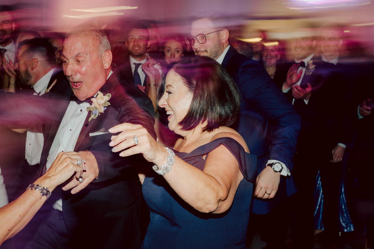 Jackie and Nick the two New Yorkers wanted to get away from busy packed streets of NY and get married in NJ, The Rockleigh NJ. Jackie got ready at her parents house in Hasbrouck Heights in NJ where her mom and bridesmaids showered her with love while they got ready together for her wedding. Nick also got ready at his parents house in Park Ridge NJ. Jackie & Nick got into their limos and drove to the chapel Our Lady of mercy Church in Park Ridge NJ for their wedding ceremony. Jackie and Nick's beautiful wedding ceremony was over at Our Lady of Mercy Church followed by family photos at the church before heading over to The Rockleigh for their wedding reception and to party! The Rockleigh's garden's were beautiful with flowers and perfectly manicured bushes, trees and flowers. I did all of Jackie and Nick's wedding photos at the garden at The Rockleigh including extended family photos, bridal party photos as well as newly weds couple's photos. Then Jackie and Nick joined their guests at their cocktail hour to start their wedding party. Fun and beautiful wedding reception continued till midnight at The Rockleigh. Jackie and Nick's The Rockleigh NJ Wedding documented by by Karis | Hey Karis | Catskills, Hudson Valley NY elopement and wedding photographer | Brooklyn NY elopement and wedding photographer | Manhattan NY elopement and wedding photographer | Hey Karis is fun documentary wedding and elopement photographer.
