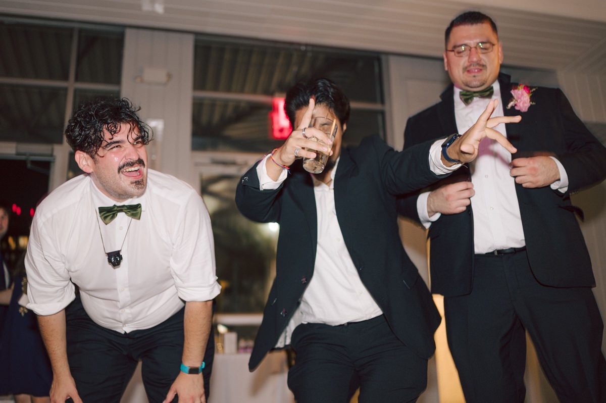 It's with immense joy that I share the unforgettable moments from Katherine and Omar's enchanting wedding day at The W Loft in Brooklyn, New York. Katherine and Omar saw each other for the first time rooftop of The W Loft with stunning backdrop of the city's skyline. The two spend some time talking and admiring each other during their first look, then as the moment finished and Katherine and Omar gave me the cue that they are ready to go to Domino Park (Williamsburg Bridge and the East River at the backdrop) was only around the corner from The W Loft for their wedding photos. We walked together with Katherine and Omar's bridal party to Domino Park, it was a typical hot NY summer on their wedding day and doing photos outside in the heat wasn't easy especially with so many people/crowd at Domino Park but we managed and even grabbed ice cream on the way back to The W Loft. Rooftop was busy setting up for Katherine and Omar's wedding ceremony with few guests already filing in the seats. Katherine and Omar's breathtaking wedding ceremony on The W Loft rooftop with Williamsburg Bridge to the side, the East River with city scape was a perfect backdrop for these New Yorkers to say their I do's. Then Katherine and Omar listened to sweet talks offered by their friends and family enjoyed their wedding reception. Katherine and Omar's The W Loft Brooklyn NY wedding documented by by Karis | Hey Karis | Catskills, Hudson Valley NY elopement and wedding photographer | Brooklyn NY elopement and wedding photographer | Manhattan NY elopement and wedding photographer | Hey Karis is fun documentary wedding and elopement photographer.