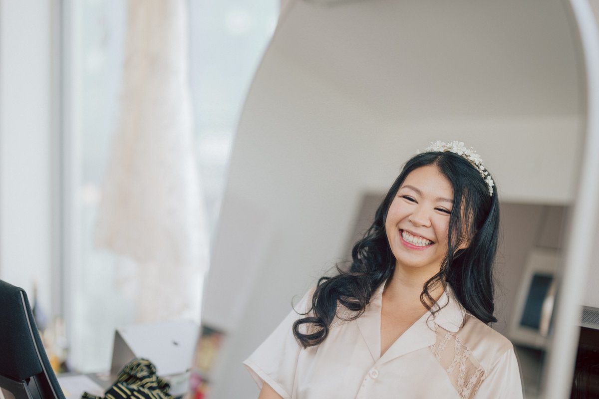 It's with immense joy that I share the unforgettable moments from Katherine and Omar's enchanting wedding day at The W Loft in Brooklyn, New York. Katherine and Omar saw each other for the first time rooftop of The W Loft with stunning backdrop of the city's skyline. The two spend some time talking and admiring each other during their first look, then as the moment finished and Katherine and Omar gave me the cue that they are ready to go to Domino Park (Williamsburg Bridge and the East River at the backdrop) was only around the corner from The W Loft for their wedding photos. We walked together with Katherine and Omar's bridal party to Domino Park, it was a typical hot NY summer on their wedding day and doing photos outside in the heat wasn't easy especially with so many people/crowd at Domino Park but we managed and even grabbed ice cream on the way back to The W Loft. Rooftop was busy setting up for Katherine and Omar's wedding ceremony with few guests already filing in the seats. Katherine and Omar's breathtaking wedding ceremony on The W Loft rooftop with Williamsburg Bridge to the side, the East River with city scape was a perfect backdrop for these New Yorkers to say their I do's. Then Katherine and Omar listened to sweet talks offered by their friends and family enjoyed their wedding reception. Katherine and Omar's The W Loft Brooklyn NY wedding documented by by Karis | Hey Karis | Catskills, Hudson Valley NY elopement and wedding photographer | Brooklyn NY elopement and wedding photographer | Manhattan NY elopement and wedding photographer | Hey Karis is fun documentary wedding and elopement photographer.