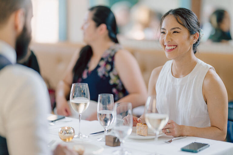 Ari and Kevin are big nature lovers, and they love the outdoors. For their intimate elopement they chose James A McFaul Environmental Center for their intimate wedding ceremony joined by their immediate family. Total of 10 people standing around Ari and Kevin surrounded by nature Ari & Kevin's sweetest wedding ceremony was held. Ari and Kevin looked at each other with the sweetest smiles it almost melted us. After the sweetest wedding ceremony at James A McFaul Environmental Center I took some wedding photos of Ari and Kevin then we left for Ari and Kevin's small and intimate dinner with family at Jockey Hollow Bar & Kitchen Morristown NJ. Morristown is such a beautiful town, and in front of Jockey Hollow Bar & Kitchen is such a picturesque backdrop with long water fountain, trees and flowers. So before Ari and Kevin sat down for their intimate dinner with family we walked around Morristown for quick photos. Then all 10 of them sat down in a private room at Jockey Hollow Bar & Kitchen to celebrate Ari and Kevin's union. Air and Kevin's James A McFaul Environmental Center and Jockey Hollow Bar & Kitchen Morristown NJ Elopement documented by by Karis | Hey Karis | Catskills, Hudson Valley NY elopement and wedding photographer | Brooklyn NY elopement and wedding photographer | Manhattan NY elopement and wedding photographer | Hey Karis is fun documentary wedding and elopement photographer.