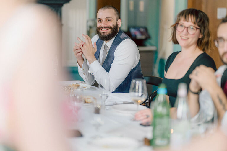 Ari and Kevin are big nature lovers, and they love the outdoors. For their intimate elopement they chose James A McFaul Environmental Center for their intimate wedding ceremony joined by their immediate family. Total of 10 people standing around Ari and Kevin surrounded by nature Ari & Kevin's sweetest wedding ceremony was held. Ari and Kevin looked at each other with the sweetest smiles it almost melted us. After the sweetest wedding ceremony at James A McFaul Environmental Center I took some wedding photos of Ari and Kevin then we left for Ari and Kevin's small and intimate dinner with family at Jockey Hollow Bar & Kitchen Morristown NJ. Morristown is such a beautiful town, and in front of Jockey Hollow Bar & Kitchen is such a picturesque backdrop with long water fountain, trees and flowers. So before Ari and Kevin sat down for their intimate dinner with family we walked around Morristown for quick photos. Then all 10 of them sat down in a private room at Jockey Hollow Bar & Kitchen to celebrate Ari and Kevin's union. Air and Kevin's James A McFaul Environmental Center and Jockey Hollow Bar & Kitchen Morristown NJ Elopement documented by by Karis | Hey Karis | Catskills, Hudson Valley NY elopement and wedding photographer | Brooklyn NY elopement and wedding photographer | Manhattan NY elopement and wedding photographer | Hey Karis is fun documentary wedding and elopement photographer.