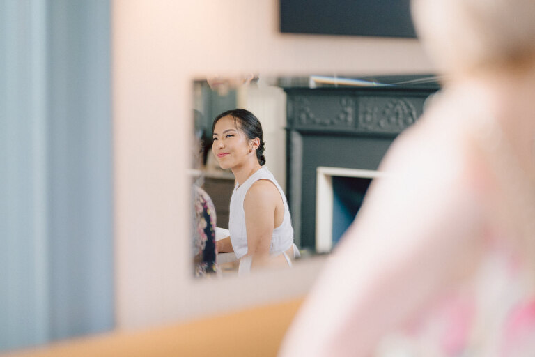 Ari and Kevin are big nature lovers, and they love the outdoors. For their intimate elopement they chose James A McFaul Environmental Center for their intimate wedding ceremony joined by their immediate family. Total of 10 people standing around Ari and Kevin surrounded by nature Ari & Kevin's sweetest wedding ceremony was held. Ari and Kevin looked at each other with the sweetest smiles it almost melted us. After the sweetest wedding ceremony at James A McFaul Environmental Center I took some wedding photos of Ari and Kevin then we left for Ari and Kevin's small and intimate dinner with family at Jockey Hollow Bar & Kitchen Morristown NJ. Morristown is such a beautiful town, and in front of Jockey Hollow Bar & Kitchen is such a picturesque backdrop with long water fountain, trees and flowers. So before Ari and Kevin sat down for their intimate dinner with family we walked around Morristown for quick photos. Then all 10 of them sat down in a private room at Jockey Hollow Bar & Kitchen to celebrate Ari and Kevin's union. Air and Kevin's James A McFaul Environmental Center and Jockey Hollow Bar & Kitchen Morristown NJ Elopement documented by by Karis | Hey Karis | Catskills, Hudson Valley NY elopement and wedding photographer | Brooklyn NY elopement and wedding photographer | Manhattan NY elopement and wedding photographer | Hey Karis is fun documentary wedding and elopement photographer.