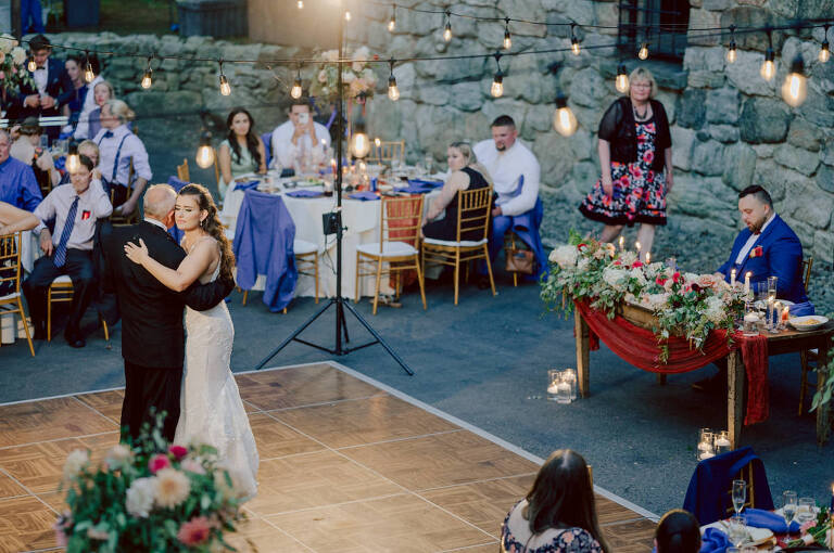How do I explain the sincere and true feelings that Izzy and Brendan shared on their wedding day at one of the most magical place Arrow Park in Monroe NY. Izzy is Opera singer and Brendan is a Chef who owns his own restaurant called Circle in Newton, NJ got married at Arrow Park NY a month ago and it got real festive and wild real fast. But let's come back to the wild party in a bit and talk about their morning first. Izzy and Brendan both got ready onsite at Arrow Park, great thing about Arrow Park is that it has enough rooms to host all their bridal party and family. With all of Izzy and Brendan's loved ones onsite Izzy and Brendan's wedding prep was fun. No drama and no one running late, Izzy and Brendan's wedding prep went so smooth with everyone's cooperation! Izzy got into her dress with her mom and sister by her side, then we went down to the back steps for Izzy and Brendan's first look. Oh boy Brendan got super emotional for their first look, he couldn't even turn around to look at Izzy with all the happy emotions rushing to him. Izzy held his hand and they looked at each other. The two of them cried. Sharing such a beautiful first look Izzy and Brendan walked out to the front of Arrow Park for group and family photos. It was an August wedding so I kept everyone in the shade not too far, making it simple easy for group and family photos are important job to wedding photographer. After all the formal group photos were done, it was almost time for their wedding ceremony at the garden. Beautiful decor and floral arrangements were set up in the garden ready for Izzy and Brendan's wedding ceremony, guest started to walked down the long driveway and down the steps and found seats waited for the bride and groom to walk down the aisle. Brendan now standing in the front next to the priest, started tearing up as soon as he saw Izzy coming down the aisle escorted by her father. The two linked their eyes at each other and in the most loving way possible looked at each other through out the ceremony then sealed it with the first kiss as husband and wife. As calm and peaceful as Izzy and Brendan's wedding ceremony was, the two entered their reception each with (shaken) champagne bottles in their hands, everyone and anyone in Izzy and Brendan's way got sprayed with Champagne! They jumped, pouring Champagne into their friends mouth straight out of the bottle, then each drank some out of the bottle. Building the excitement in to their epic wedding party, Izzy and Brendan held each others hands and walked into the center of Arrow Park's courtyard and danced their first dance. Smoke and smell of freshly cooked dinner being prepared by Brendan's friends at Promises Kept Hudson Valley NY was filling the air, as first courses were being served. Happiest sound of plates, utensils and people chatting, Izzy and Brendan sat at their sweetheart table to enjoy their wedding dinner prepared by Promises Kept Hudson Valley NY. Then the evening got deeper and darker and vibe got stronger and crazier. Music got louder and everyone was in their element celebrating Izzy and Brendan on their wedding day. Izzy and Brendan's Arrow Park Monroe NY Wedding documented by by Karis | Hey Karis | Catskills, Hudson Valley NY elopement and wedding photographer | Brooklyn NY elopement and wedding photographer | Manhattan NY elopement and wedding photographer | Hey Karis is fun documentary wedding and elopement photographer.