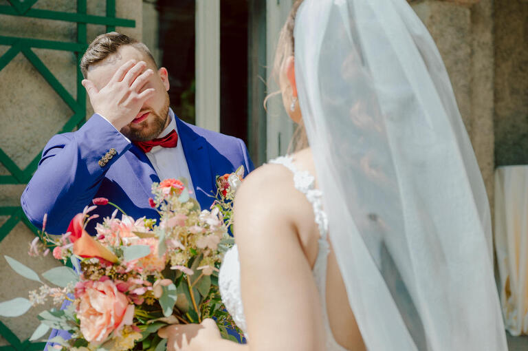 How do I explain the sincere and true feelings that Izzy and Brendan shared on their wedding day at one of the most magical place Arrow Park in Monroe NY. Izzy is Opera singer and Brendan is a Chef who owns his own restaurant called Circle in Newton, NJ got married at Arrow Park NY a month ago and it got real festive and wild real fast. But let's come back to the wild party in a bit and talk about their morning first. Izzy and Brendan both got ready onsite at Arrow Park, great thing about Arrow Park is that it has enough rooms to host all their bridal party and family. With all of Izzy and Brendan's loved ones onsite Izzy and Brendan's wedding prep was fun. No drama and no one running late, Izzy and Brendan's wedding prep went so smooth with everyone's cooperation! Izzy got into her dress with her mom and sister by her side, then we went down to the back steps for Izzy and Brendan's first look. Oh boy Brendan got super emotional for their first look, he couldn't even turn around to look at Izzy with all the happy emotions rushing to him. Izzy held his hand and they looked at each other. The two of them cried. Sharing such a beautiful first look Izzy and Brendan walked out to the front of Arrow Park for group and family photos. It was an August wedding so I kept everyone in the shade not too far, making it simple easy for group and family photos are important job to wedding photographer. After all the formal group photos were done, it was almost time for their wedding ceremony at the garden. Beautiful decor and floral arrangements were set up in the garden ready for Izzy and Brendan's wedding ceremony, guest started to walked down the long driveway and down the steps and found seats waited for the bride and groom to walk down the aisle. Brendan now standing in the front next to the priest, started tearing up as soon as he saw Izzy coming down the aisle escorted by her father. The two linked their eyes at each other and in the most loving way possible looked at each other through out the ceremony then sealed it with the first kiss as husband and wife. As calm and peaceful as Izzy and Brendan's wedding ceremony was, the two entered their reception each with (shaken) champagne bottles in their hands, everyone and anyone in Izzy and Brendan's way got sprayed with Champagne! They jumped, pouring Champagne into their friends mouth straight out of the bottle, then each drank some out of the bottle. Building the excitement in to their epic wedding party, Izzy and Brendan held each others hands and walked into the center of Arrow Park's courtyard and danced their first dance. Smoke and smell of freshly cooked dinner being prepared by Brendan's friends at Promises Kept Hudson Valley NY was filling the air, as first courses were being served. Happiest sound of plates, utensils and people chatting, Izzy and Brendan sat at their sweetheart table to enjoy their wedding dinner prepared by Promises Kept Hudson Valley NY. Then the evening got deeper and darker and vibe got stronger and crazier. Music got louder and everyone was in their element celebrating Izzy and Brendan on their wedding day. Izzy and Brendan's Arrow Park Monroe NY Wedding documented by by Karis | Hey Karis | Catskills, Hudson Valley NY elopement and wedding photographer | Brooklyn NY elopement and wedding photographer | Manhattan NY elopement and wedding photographer | Hey Karis is fun documentary wedding and elopement photographer.