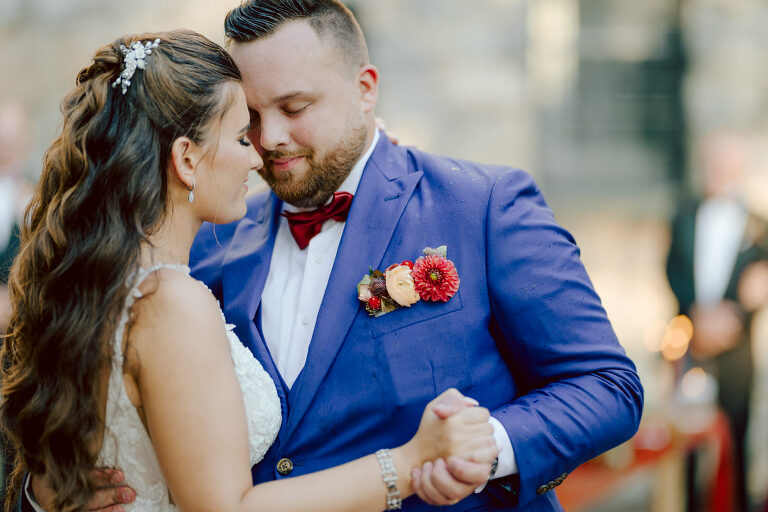 How do I explain the sincere and true feelings that Izzy and Brendan shared on their wedding day at one of the most magical place Arrow Park in Monroe NY. Izzy is Opera singer and Brendan is a Chef who owns his own restaurant called Circle in Newton, NJ got married at Arrow Park NY a month ago and it got real festive and wild real fast. But let's come back to the wild party in a bit and talk about their morning first. Izzy and Brendan both got ready onsite at Arrow Park, great thing about Arrow Park is that it has enough rooms to host all their bridal party and family. With all of Izzy and Brendan's loved ones onsite Izzy and Brendan's wedding prep was fun. No drama and no one running late, Izzy and Brendan's wedding prep went so smooth with everyone's cooperation! Izzy got into her dress with her mom and sister by her side, then we went down to the back steps for Izzy and Brendan's first look. Oh boy Brendan got super emotional for their first look, he couldn't even turn around to look at Izzy with all the happy emotions rushing to him. Izzy held his hand and they looked at each other. The two of them cried. Sharing such a beautiful first look Izzy and Brendan walked out to the front of Arrow Park for group and family photos. It was an August wedding so I kept everyone in the shade not too far, making it simple easy for group and family photos are important job to wedding photographer. After all the formal group photos were done, it was almost time for their wedding ceremony at the garden. Beautiful decor and floral arrangements were set up in the garden ready for Izzy and Brendan's wedding ceremony, guest started to walked down the long driveway and down the steps and found seats waited for the bride and groom to walk down the aisle. Brendan now standing in the front next to the priest, started tearing up as soon as he saw Izzy coming down the aisle escorted by her father. The two linked their eyes at each other and in the most loving way possible looked at each other through out the ceremony then sealed it with the first kiss as husband and wife. As calm and peaceful as Izzy and Brendan's wedding ceremony was, the two entered their reception each with (shaken) champagne bottles in their hands, everyone and anyone in Izzy and Brendan's way got sprayed with Champagne! They jumped, pouring Champagne into their friends mouth straight out of the bottle, then each drank some out of the bottle. Building the excitement in to their epic wedding party, Izzy and Brendan held each others hands and walked into the center of Arrow Park's courtyard and danced their first dance. Smoke and smell of freshly cooked dinner being prepared by Brendan's friends at Promises Kept Hudson Valley NY was filling the air, as first courses were being served. Happiest sound of plates, utensils and people chatting, Izzy and Brendan sat at their sweetheart table to enjoy their wedding dinner prepared by Promises Kept Hudson Valley NY. Then the evening got deeper and darker and vibe got stronger and crazier. Music got louder and everyone was in their element celebrating Izzy and Brendan on their wedding day. Izzy and Brendan's Arrow Park Monroe NY Wedding documented by by Karis | Hey Karis | Catskills, Hudson Valley NY elopement and wedding photographer | Brooklyn NY elopement and wedding photographer | Manhattan NY elopement and wedding photographer | Hey Karis is fun documentary wedding and elopement photographer.