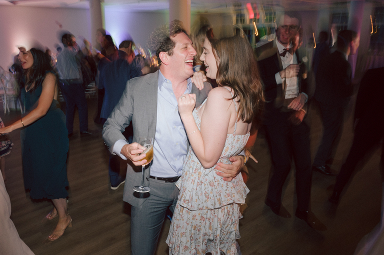 On September 1, 2023 Renee and Sam got married at Maritime Parc located in the center of Liberty State Park where you can get the best view of NYC skyline. Renee and Sam couldn't have asked for a better day, weather in October it was sunny, warm and gorgeous. Renee got ready at her parents' house in Paramus NJ where Renee intimately got ready for her wedding with her parents, two sisters and best friends. Renee's hair and makeup was done by Anna Posokhina from Bridal Squad. Once Renee was all glammed out by Anna Posokhina with help of her mother and two sisters walked into her Justin Alexander wedding dress. With final spray of Jo Malone perfume Renee walked out of her parents' house with her bridesmaids and stepped into her party bus. At the same time Sam was getting ready at Renee's sister's house in Hawthorne NJ with his family and groomsmen. Then Renee and Sam saw each other for the first time down the aisle at Our Lady of the Visitation in Paramus NJ. As soon as Sam saw Renee standing by the entrance of the church started crying. With plenty time for photo we arrived at Liberty State Park where Renee only wanted photos with NYC backdrop even it was staring at the bright sun and squinty eyes, i don't blame her because the view is spectacular and who wouldn't want photos with this gorgeous backdrop of NYC. Cocktail hour started and guests started fill the stairs to third floor of Maritime Parc. Renee and Sam's amazing wedding day at Maritime Parc continued with music provided by live band "The Hook Club" where they set the mood for all night of dancing. And we ended the evening with most amazing NYC skyline with Super moon rising above NYC. Renee and Sam's Maritime Park Jersey City NJ wedding photographed and documented by by Karis | Hey Karis | Catskills, Hudson Valley NY elopement and wedding photographer | Brooklyn NY elopement and wedding photographer | Manhattan NY elopement and wedding photographer | Hey Karis is fun documentary wedding and elopement photographer.
