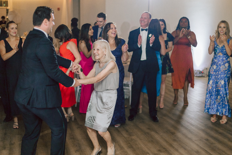 On September 1, 2023 Renee and Sam got married at Maritime Parc located in the center of Liberty State Park where you can get the best view of NYC skyline. Renee and Sam couldn't have asked for a better day, weather in October it was sunny, warm and gorgeous. Renee got ready at her parents' house in Paramus NJ where Renee intimately got ready for her wedding with her parents, two sisters and best friends. Renee's hair and makeup was done by Anna Posokhina from Bridal Squad. Once Renee was all glammed out by Anna Posokhina with help of her mother and two sisters walked into her Justin Alexander wedding dress. With final spray of Jo Malone perfume Renee walked out of her parents' house with her bridesmaids and stepped into her party bus. At the same time Sam was getting ready at Renee's sister's house in Hawthorne NJ with his family and groomsmen. Then Renee and Sam saw each other for the first time down the aisle at Our Lady of the Visitation in Paramus NJ. As soon as Sam saw Renee standing by the entrance of the church started crying. With plenty time for photo we arrived at Liberty State Park where Renee only wanted photos with NYC backdrop even it was staring at the bright sun and squinty eyes, i don't blame her because the view is spectacular and who wouldn't want photos with this gorgeous backdrop of NYC. Cocktail hour started and guests started fill the stairs to third floor of Maritime Parc. Renee and Sam's amazing wedding day at Maritime Parc continued with music provided by live band "The Hook Club" where they set the mood for all night of dancing. And we ended the evening with most amazing NYC skyline with Super moon rising above NYC. Renee and Sam's Maritime Park Jersey City NJ wedding photographed and documented by by Karis | Hey Karis | Catskills, Hudson Valley NY elopement and wedding photographer | Brooklyn NY elopement and wedding photographer | Manhattan NY elopement and wedding photographer | Hey Karis is fun documentary wedding and elopement photographer.
