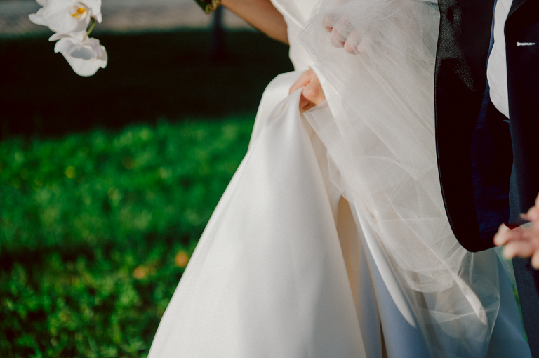 On September 1, 2023 Renee and Sam got married at Maritime Parc located in the center of Liberty State Park where you can get the best view of NYC skyline. Renee and Sam couldn't have asked for a better day, weather in October it was sunny, warm and gorgeous. Renee got ready at her parents' house in Paramus NJ where Renee intimately got ready for her wedding with her parents, two sisters and best friends. Renee's hair and makeup was done by Anna Posokhina from Bridal Squad. Once Renee was all glammed out by Anna Posokhina with help of her mother and two sisters walked into her Justin Alexander wedding dress. With final spray of Jo Malone perfume Renee walked out of her parents' house with her bridesmaids and stepped into her party bus. At the same time Sam was getting ready at Renee's sister's house in Hawthorne NJ with his family and groomsmen. Then Renee and Sam saw each other for the first time down the aisle at Our Lady of the Visitation in Paramus NJ. As soon as Sam saw Renee standing by the entrance of the church started crying. With plenty time for photo we arrived at Liberty State Park where Renee only wanted photos with NYC backdrop even it was staring at the bright sun and squinty eyes, i don't blame her because the view is spectacular and who wouldn't want photos with this gorgeous backdrop of NYC. Cocktail hour started and guests started fill the stairs to third floor of Maritime Parc. Renee and Sam's amazing wedding day at Maritime Parc continued with music provided by live band "The Hook Club" where they set the mood for all night of dancing. And we ended the evening with most amazing NYC skyline with Super moon rising above NYC. Renee and Sam's Maritime Park Jersey City NJ wedding photographed and documented by by Karis | Hey Karis | Catskills, Hudson Valley NY elopement and wedding photographer | Brooklyn NY elopement and wedding photographer | Manhattan NY elopement and wedding photographer | Hey Karis is fun documentary wedding and elopement photographer.
