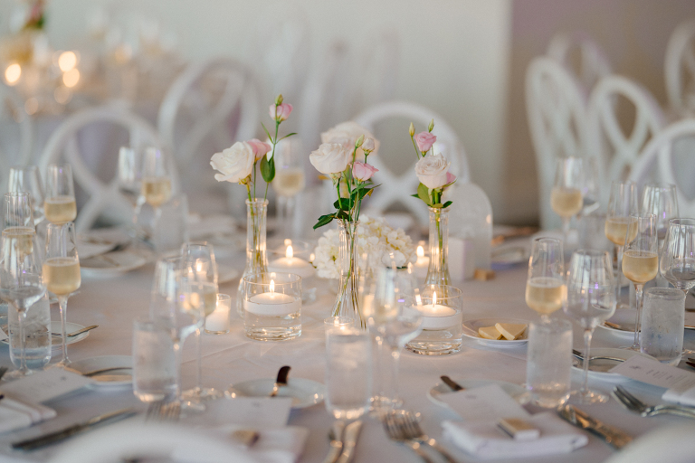 On September 1, 2023 Renee and Sam got married at Maritime Parc located in the center of Liberty State Park where you can get the best view of NYC skyline. Renee and Sam couldn't have asked for a better day, weather in October it was sunny, warm and gorgeous. Renee got ready at her parents' house in Paramus NJ where Renee intimately got ready for her wedding with her parents, two sisters and best friends. Renee's hair and makeup was done by Anna Posokhina from Bridal Squad. Once Renee was all glammed out by Anna Posokhina with help of her mother and two sisters walked into her Justin Alexander wedding dress. With final spray of Jo Malone perfume Renee walked out of her parents' house with her bridesmaids and stepped into her party bus. At the same time Sam was getting ready at Renee's sister's house in Hawthorne NJ with his family and groomsmen. Then Renee and Sam saw each other for the first time down the aisle at Our Lady of the Visitation in Paramus NJ. As soon as Sam saw Renee standing by the entrance of the church started crying. With plenty time for photo we arrived at Liberty State Park where Renee only wanted photos with NYC backdrop even it was staring at the bright sun and squinty eyes, i don't blame her because the view is spectacular and who wouldn't want photos with this gorgeous backdrop of NYC. Cocktail hour started and guests started fill the stairs to third floor of Maritime Parc. Renee and Sam's amazing wedding day at Maritime Parc continued with music provided by live band "The Hook Club" where they set the mood for all night of dancing. And we ended the evening with most amazing NYC skyline with Super moon rising above NYC. Renee and Sam's Maritime Park Jersey City NJ wedding photographed and documented by by Karis | Hey Karis | Catskills, Hudson Valley NY elopement and wedding photographer | Brooklyn NY elopement and wedding photographer | Manhattan NY elopement and wedding photographer | Hey Karis is fun documentary wedding and elopement photographer.
