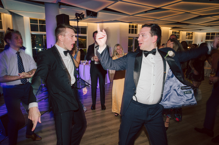 On September 1, 2023 Renee and Sam got married at Maritime Parc located in the center of Liberty State Park where you can get the best view of NYC skyline. Renee and Sam couldn't have asked for a better day, weather in October it was sunny, warm and gorgeous. Renee got ready at her parents' house in Paramus NJ where Renee intimately got ready for her wedding with her parents, two sisters and best friends. Renee's hair and makeup was done by Anna Posokhina from Bridal Squad. Once Renee was all glammed out by Anna Posokhina with help of her mother and two sisters walked into her Justin Alexander wedding dress. With final spray of Jo Malone perfume Renee walked out of her parents' house with her bridesmaids and stepped into her party bus. At the same time Sam was getting ready at Renee's sister's house in Hawthorne NJ with his family and groomsmen. Then Renee and Sam saw each other for the first time down the aisle at Our Lady of the Visitation in Paramus NJ. As soon as Sam saw Renee standing by the entrance of the church started crying. With plenty time for photo we arrived at Liberty State Park where Renee only wanted photos with NYC backdrop even it was staring at the bright sun and squinty eyes, i don't blame her because the view is spectacular and who wouldn't want photos with this gorgeous backdrop of NYC. Cocktail hour started and guests started fill the stairs to third floor of Maritime Parc. Renee and Sam's amazing wedding day at Maritime Parc continued with music provided by live band "The Hook Club" where they set the mood for all night of dancing. And we ended the evening with most amazing NYC skyline with Super moon rising above NYC. Renee and Sam's Maritime Park Jersey City NJ wedding photographed and documented by by Karis | Hey Karis | Catskills, Hudson Valley NY elopement and wedding photographer | Brooklyn NY elopement and wedding photographer | Manhattan NY elopement and wedding photographer | Hey Karis is fun documentary wedding and elopement photographer.
